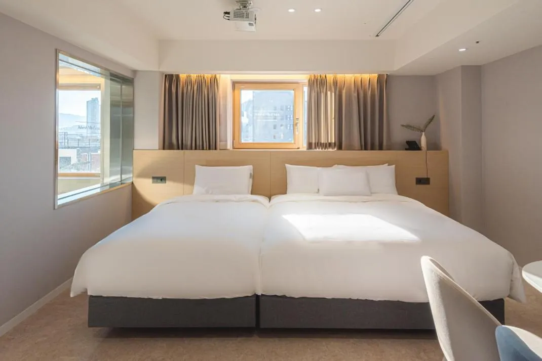 Bed in Asherah Villa d' aqua Hotel