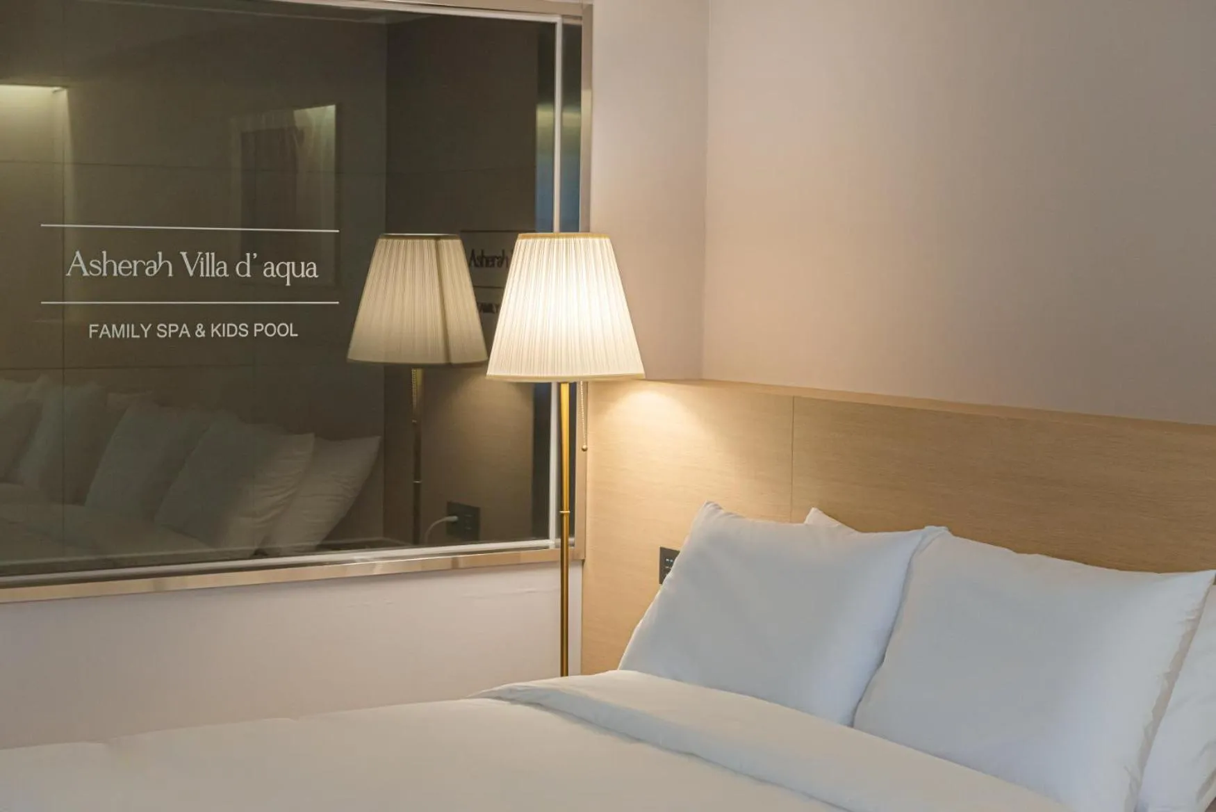 Bed in Asherah Villa d' aqua Hotel