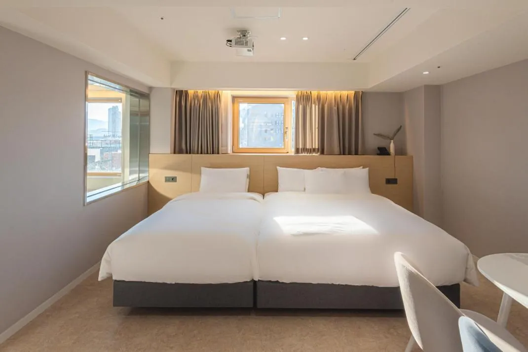 Bed in Asherah Villa d' aqua Hotel