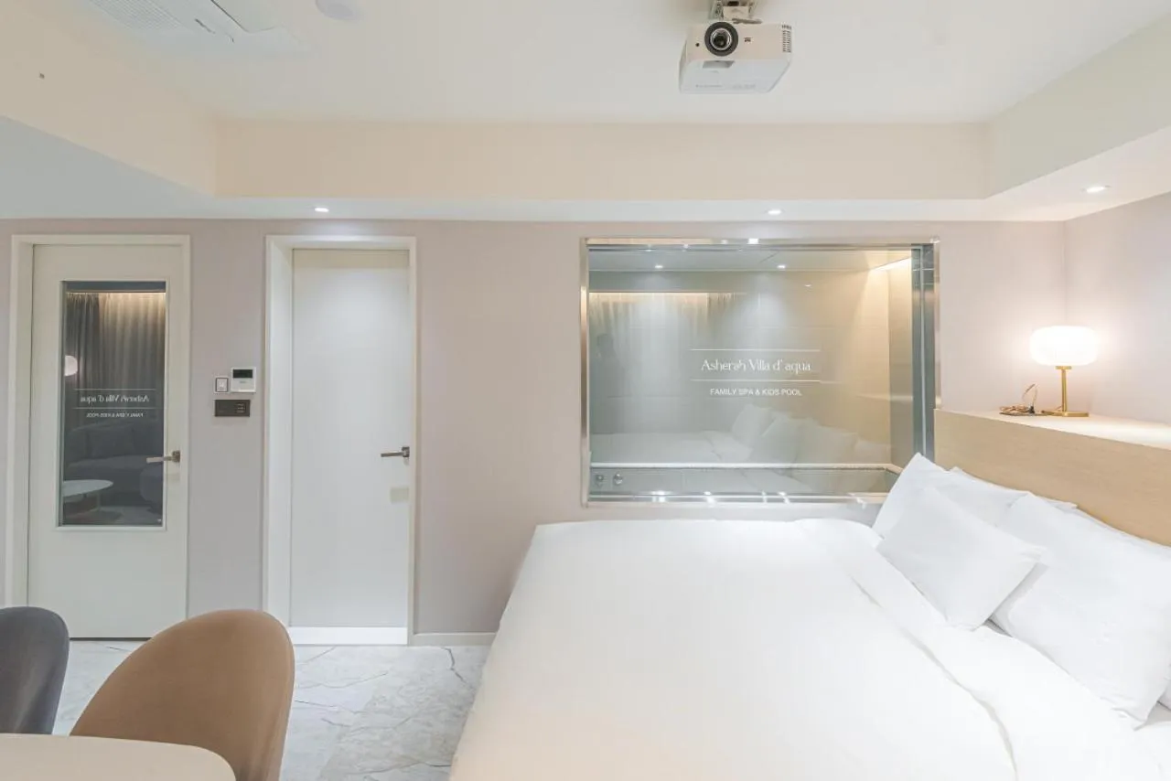 Bed in Asherah Villa d' aqua Hotel