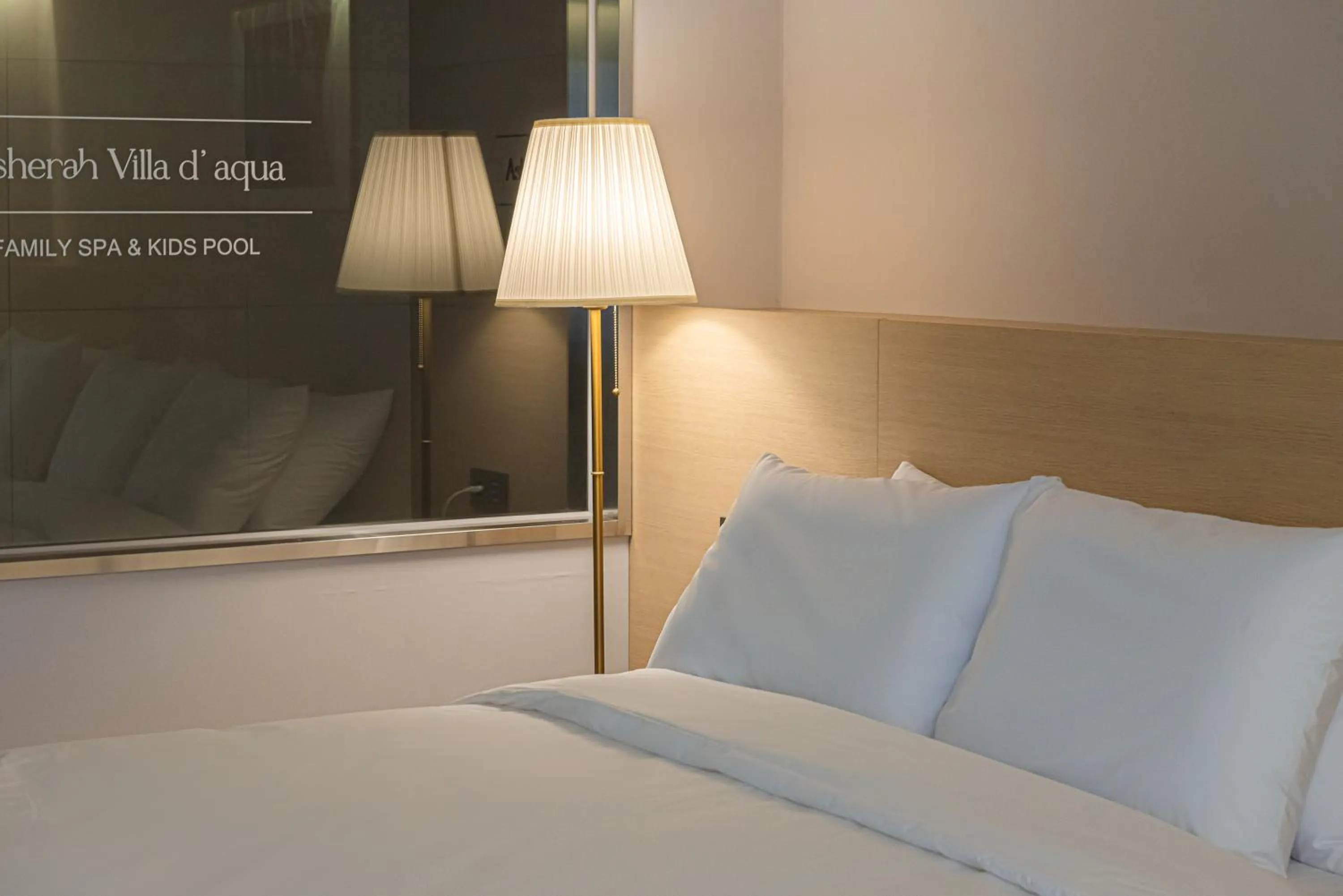 Bed in Asherah Villa d' aqua Hotel