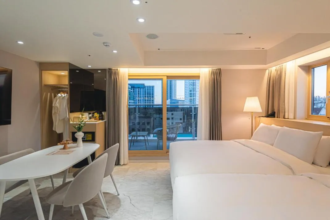 Bed in Asherah Villa d' aqua Hotel