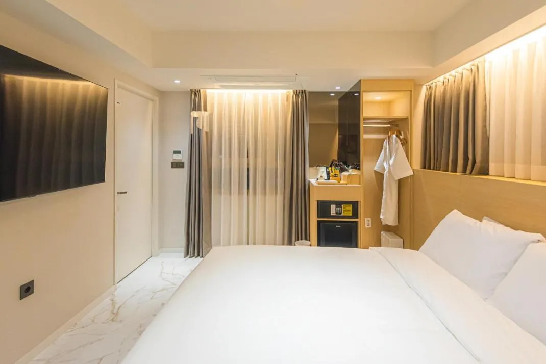 Bed in Asherah Villa d' aqua Hotel