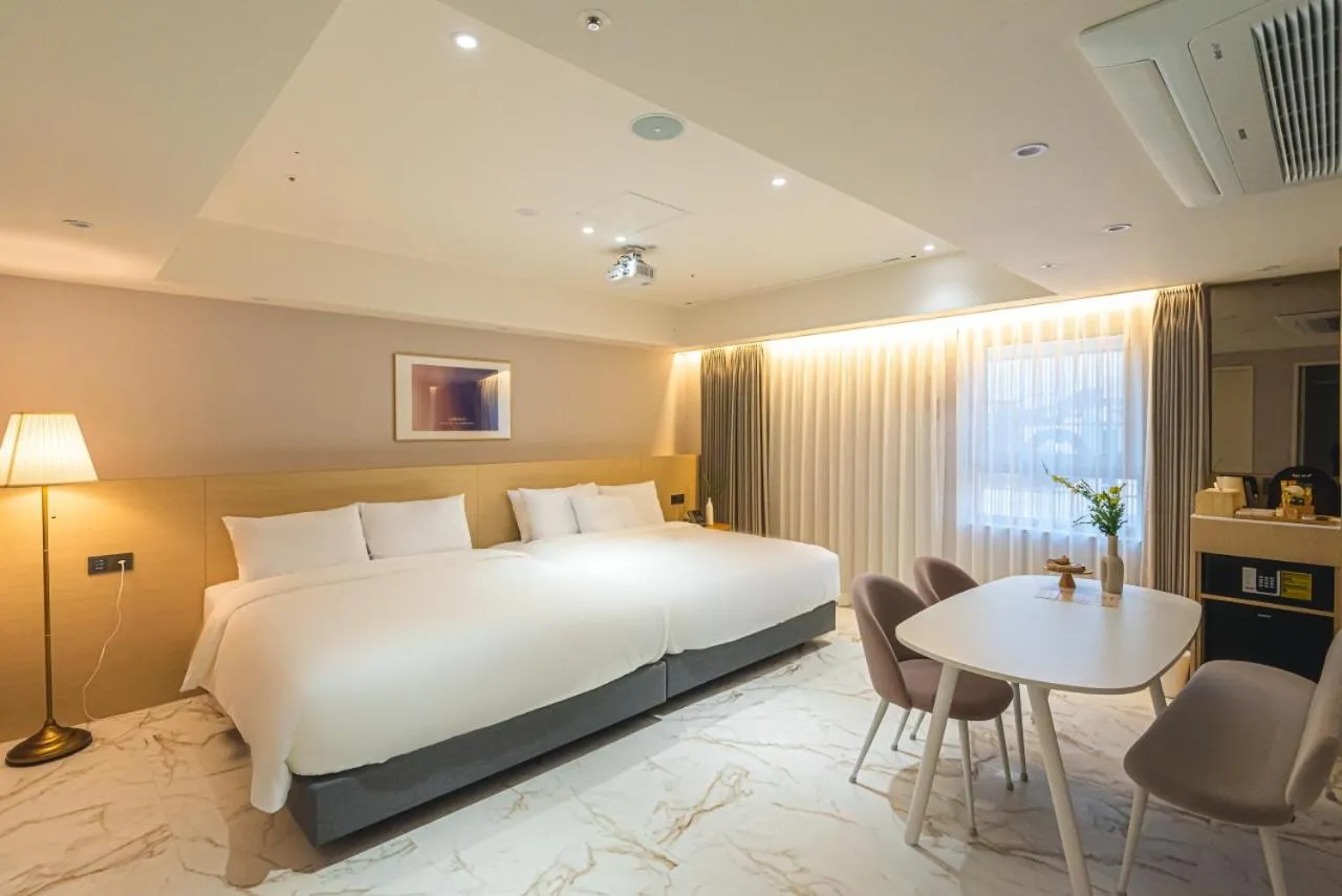 Bed in Asherah Villa d' aqua Hotel