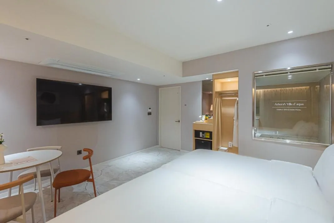 Bed in Asherah Villa d' aqua Hotel