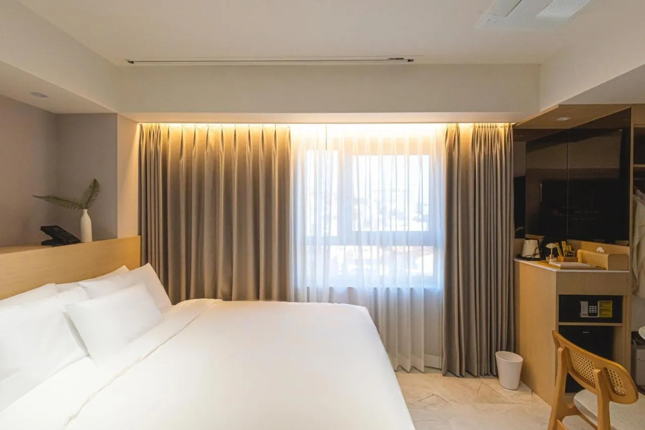 Bed in Asherah Villa d' aqua Hotel