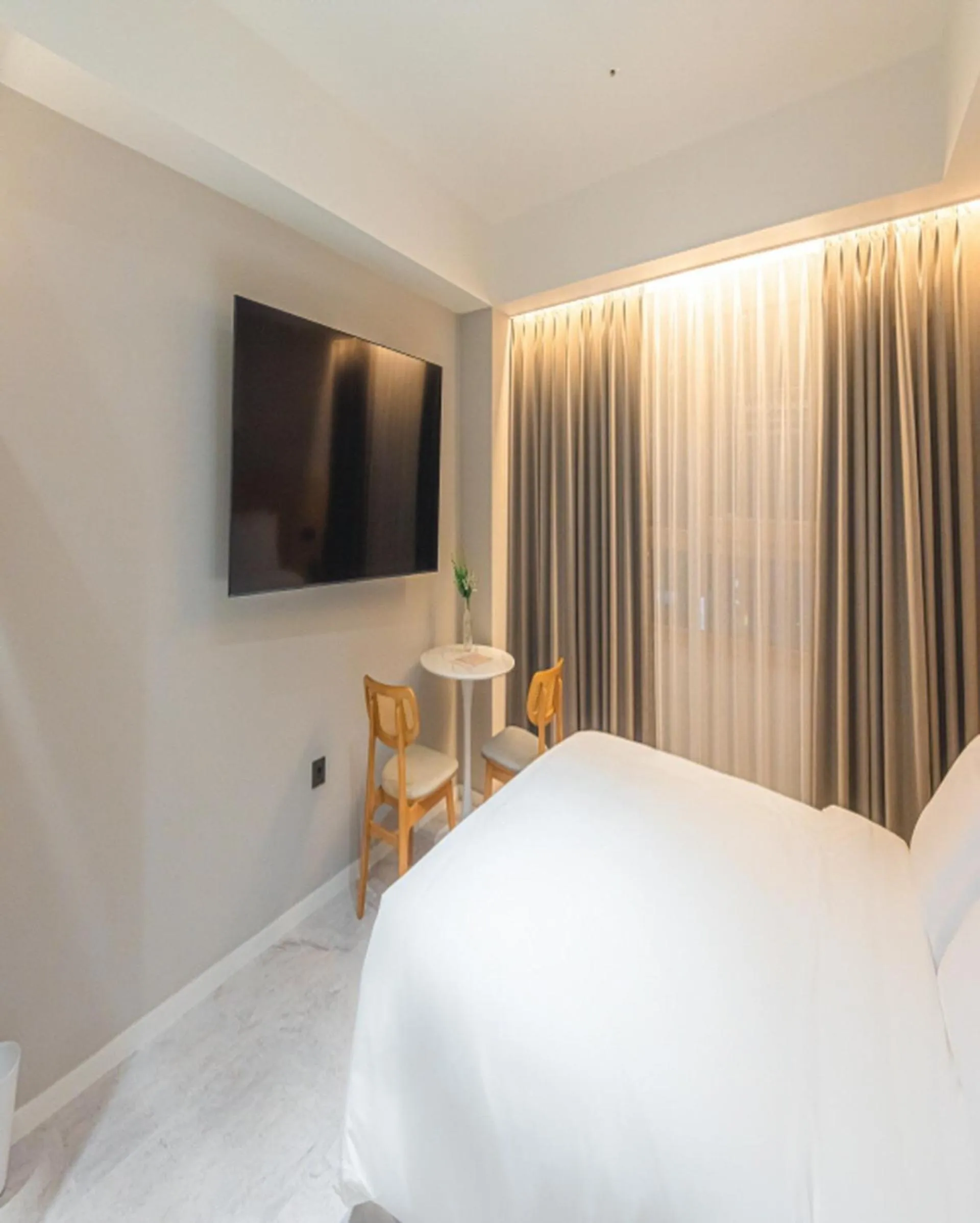 Bed in Asherah Villa d' aqua Hotel