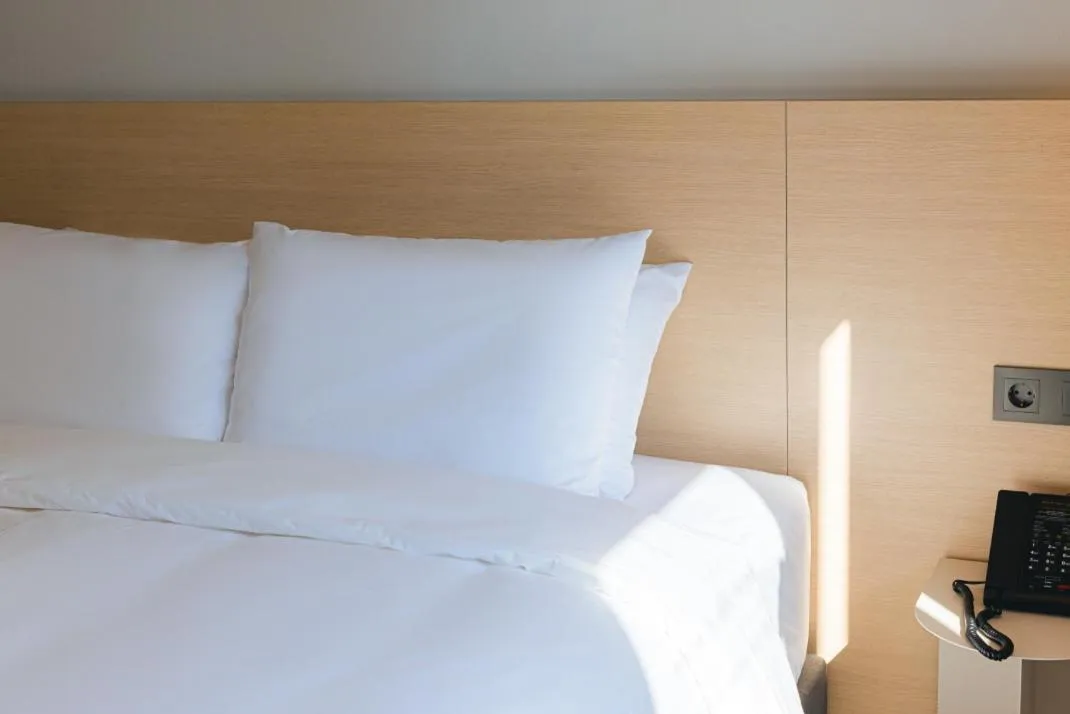 Bed in Asherah Villa d' aqua Hotel