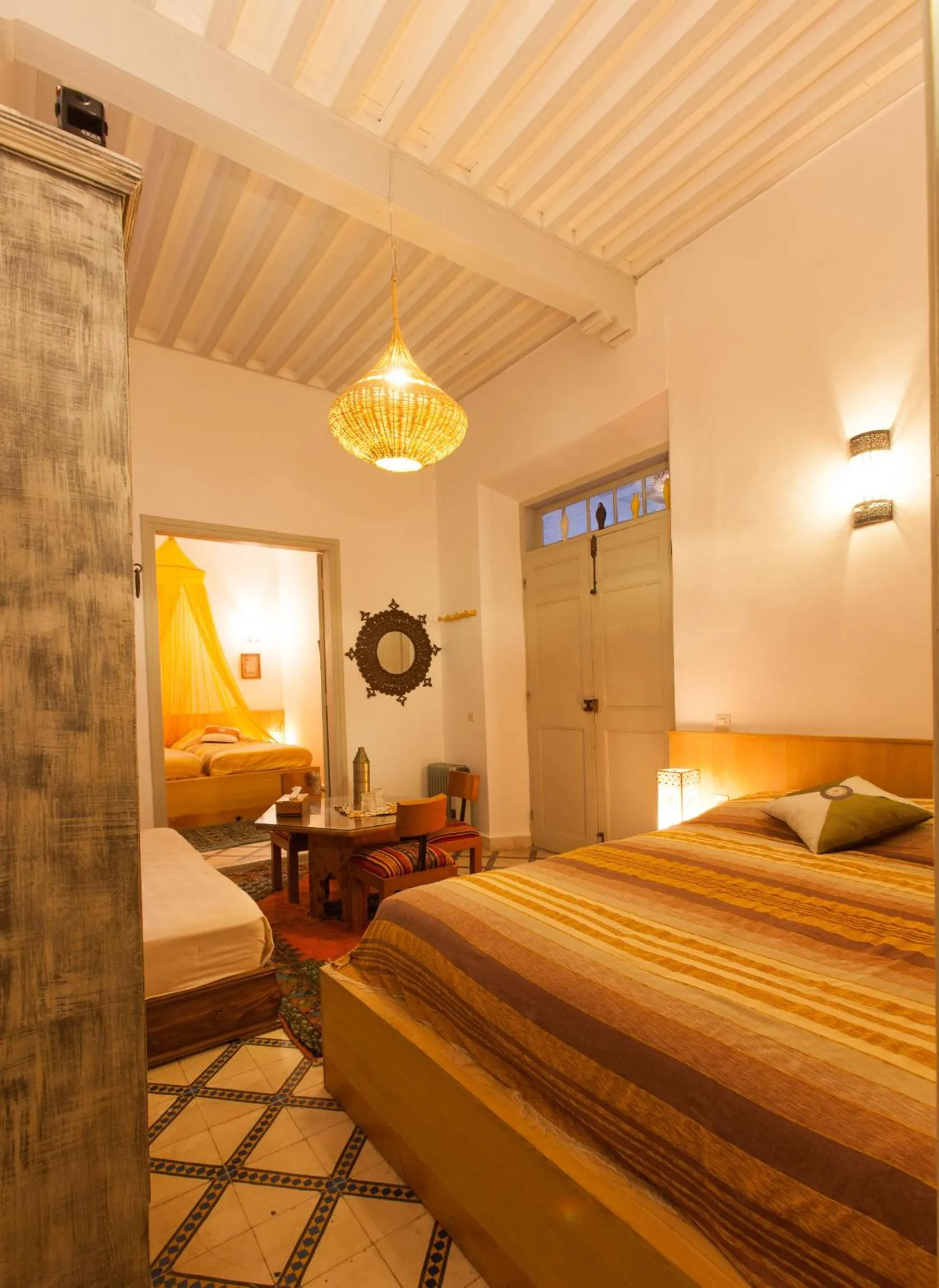 Living room, Bed in Riad Al Zahia