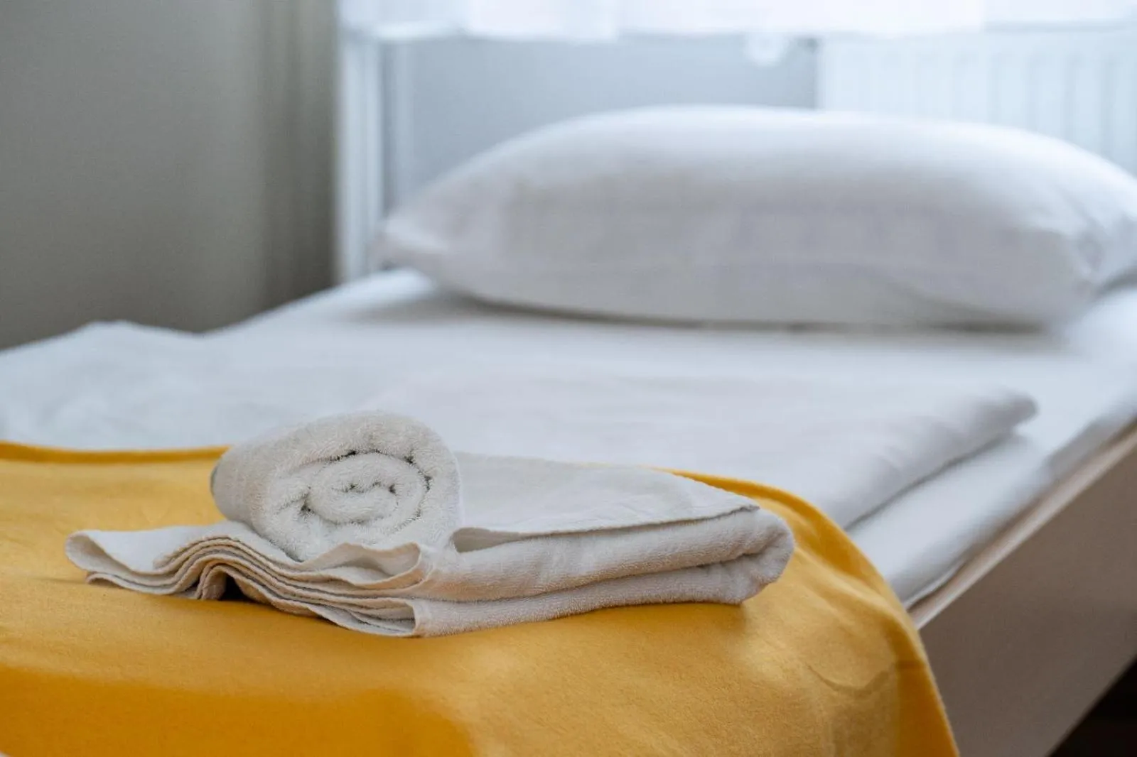 Bed in Artearia Hotel