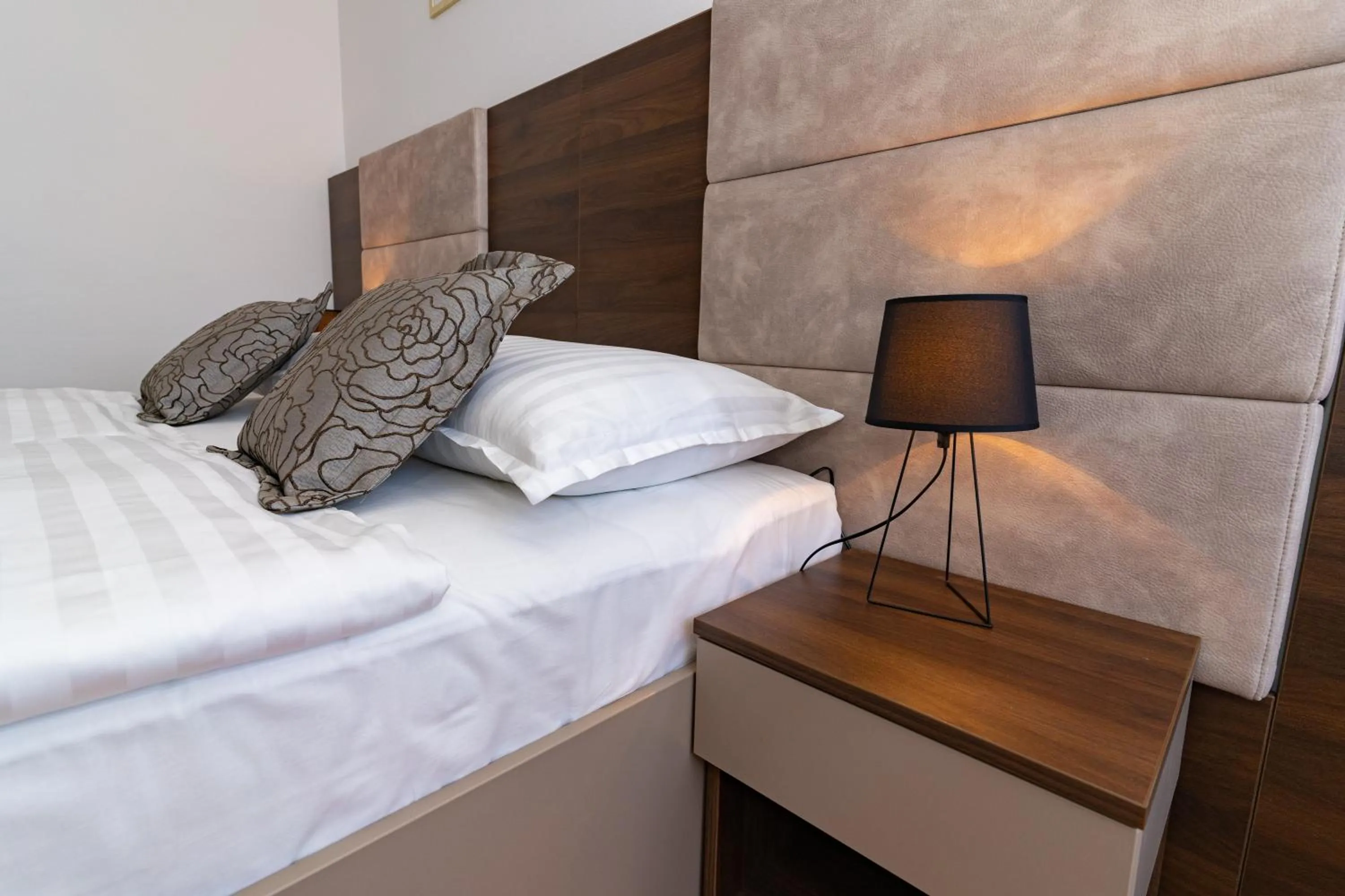 Bed in Artearia Hotel