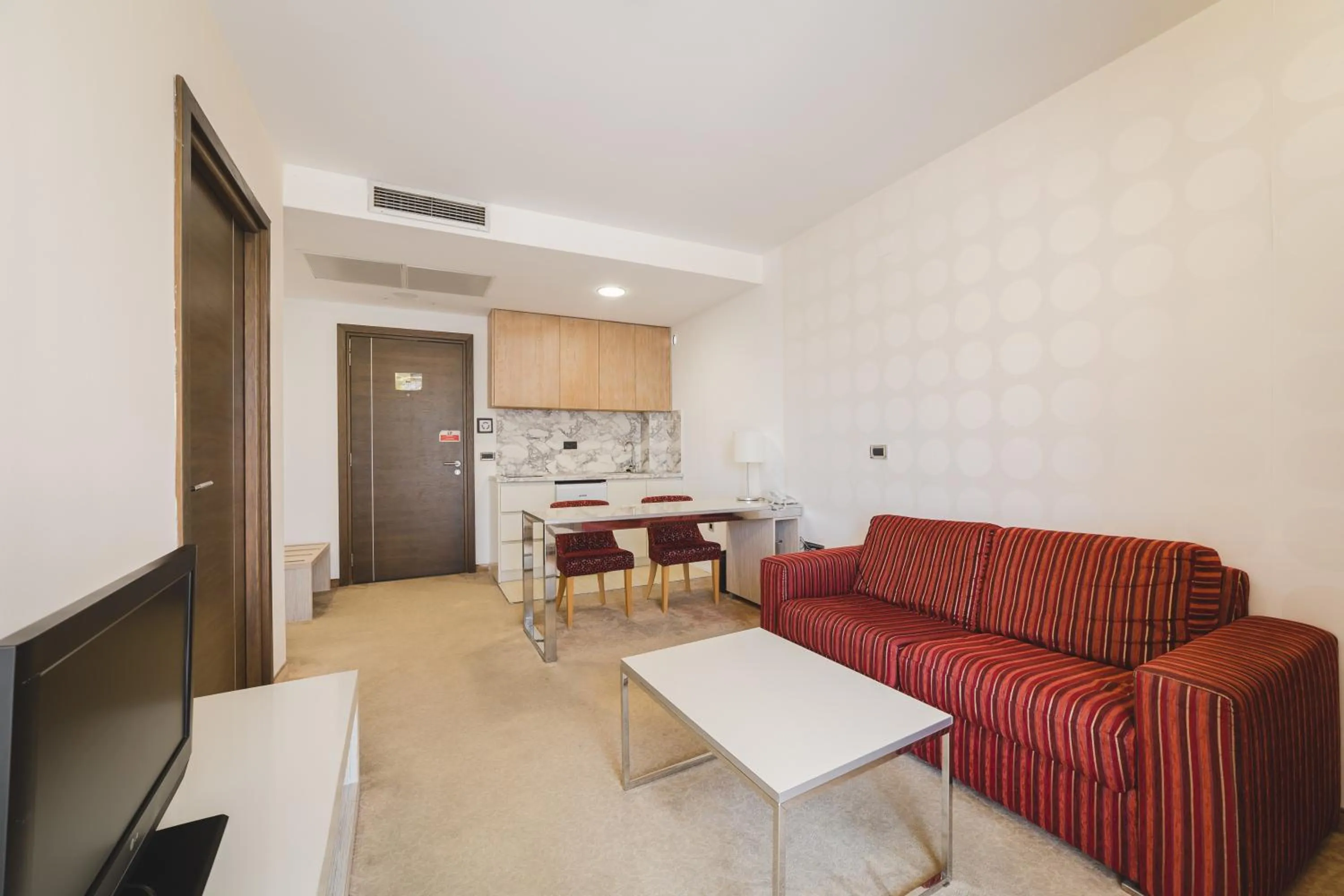 Kitchen or kitchenette in Hotel & Apartments HEC Residence