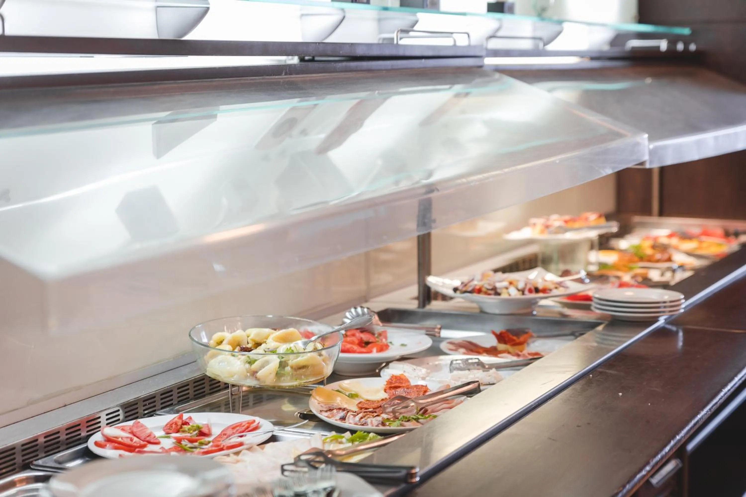 Buffet breakfast in Hotel & Apartments HEC Residence