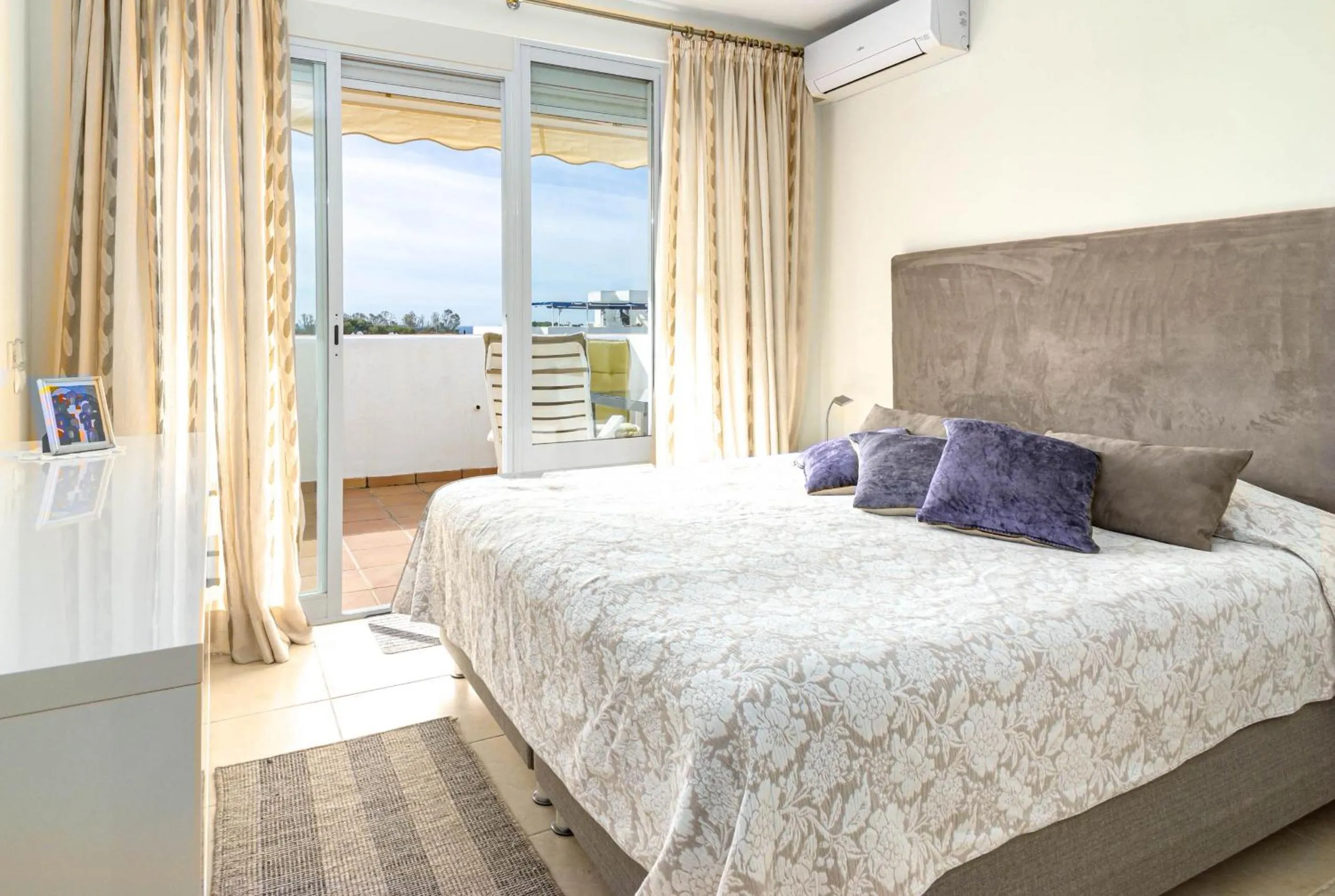 Bed in Andalusian Elegance apartment in El Paraiso with 360 views over Sea and Mountains