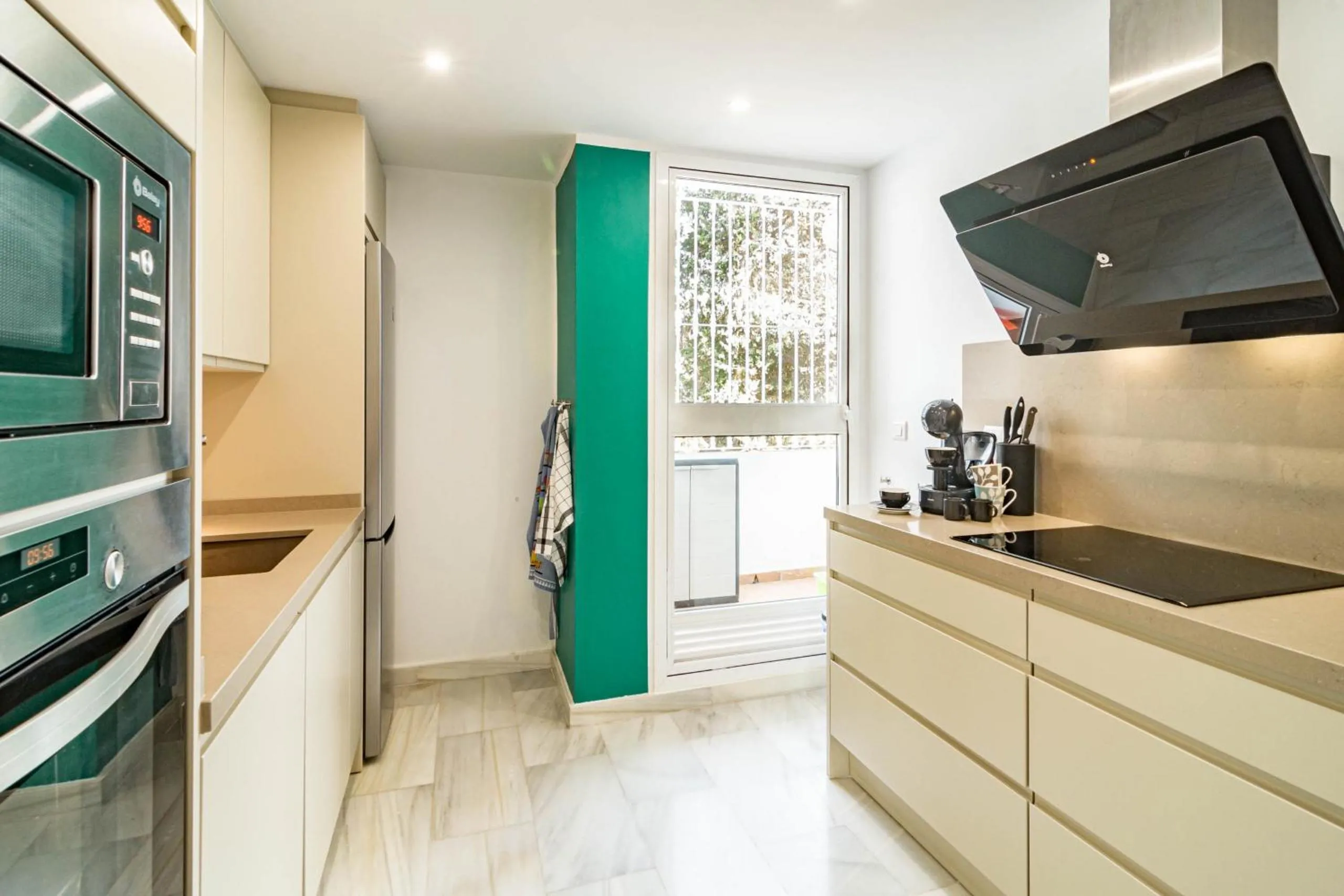 Kitchen or kitchenette in Andalusian Elegance apartment in El Paraiso with 360 views over Sea and Mountains