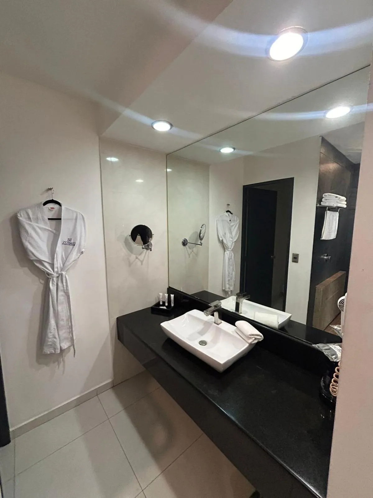 Shower in Zújmú Business Boutique Hotel