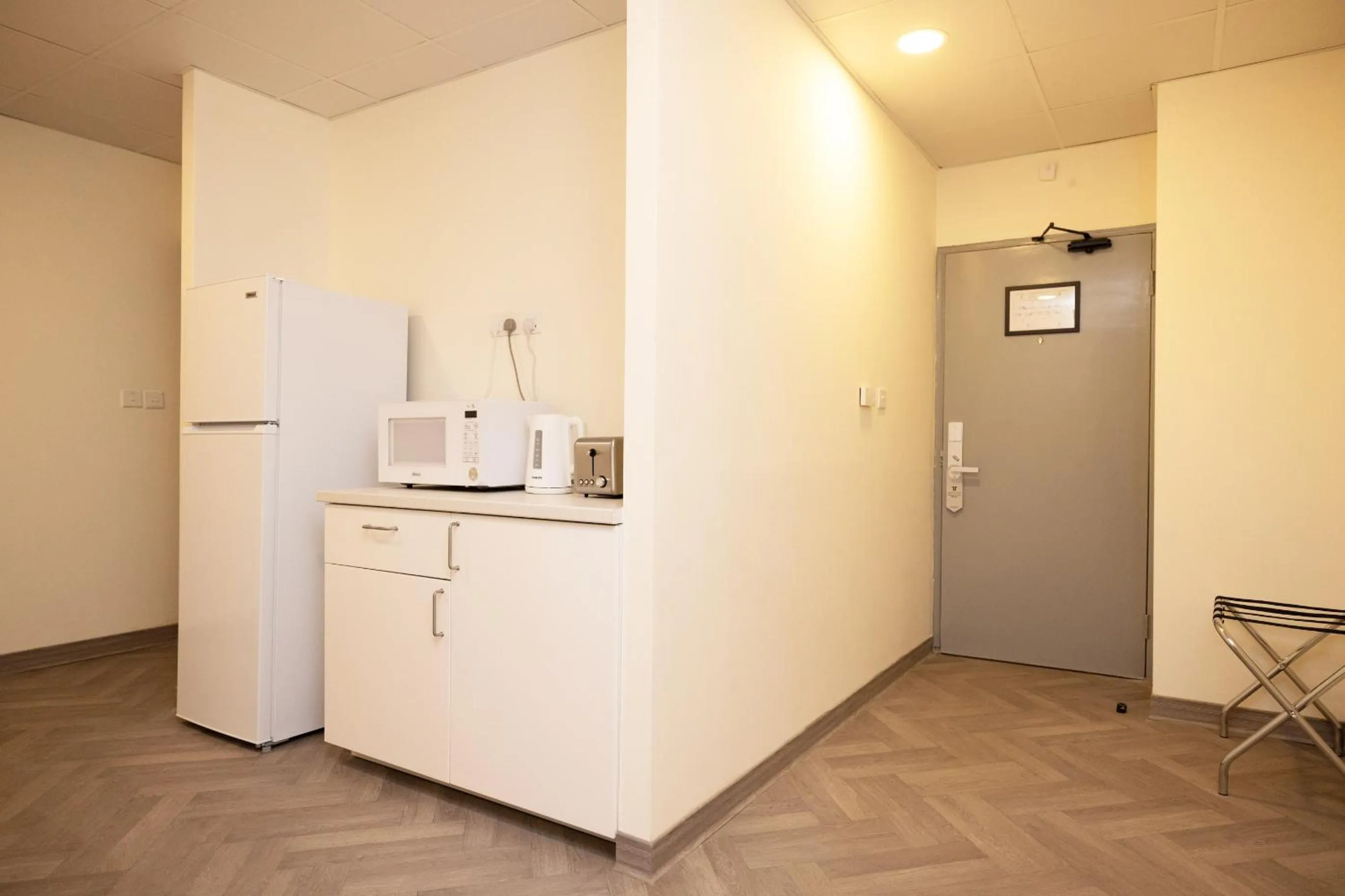 Kitchen or kitchenette in Riggae Tower Hotel