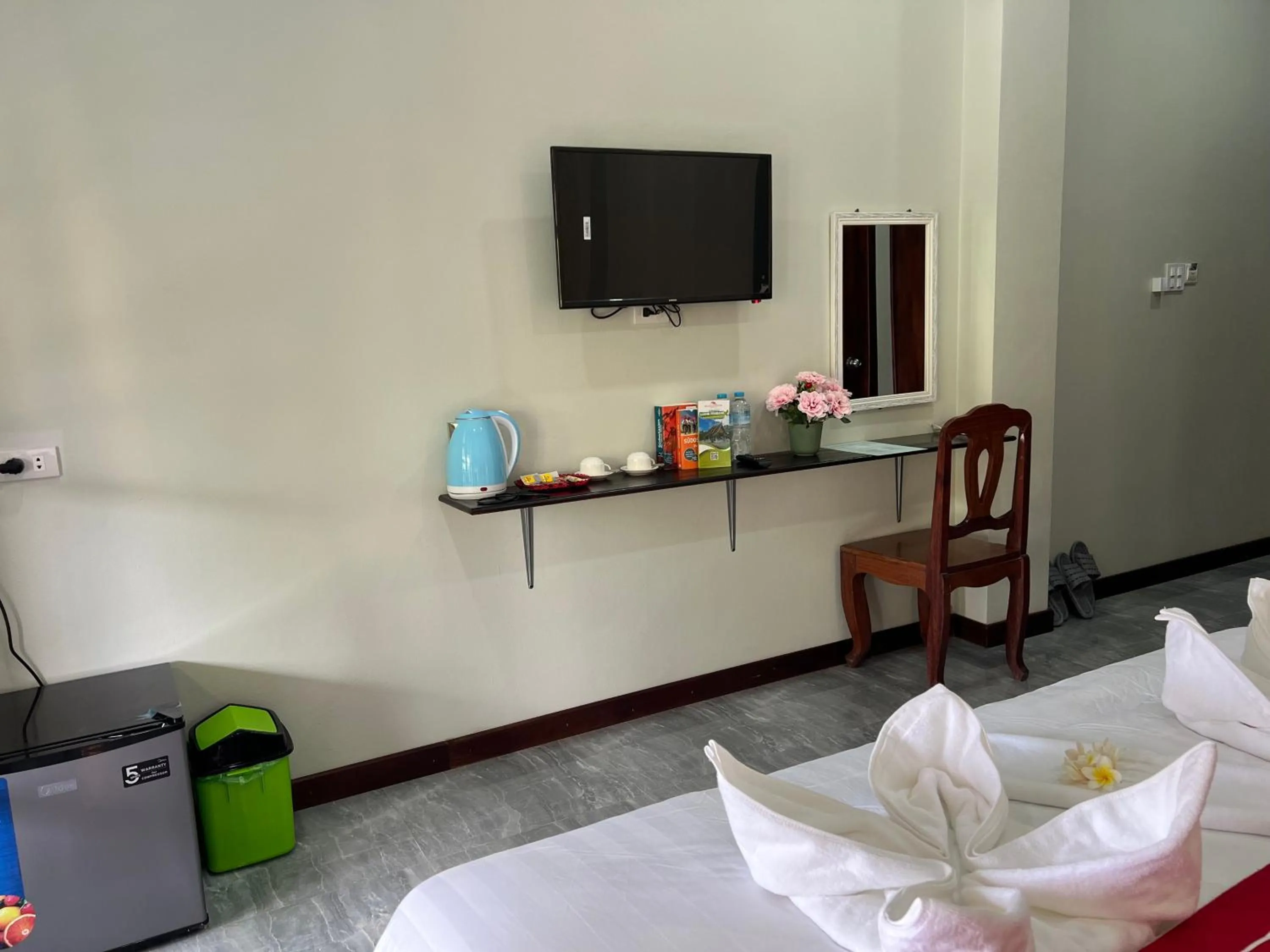 Bed in Le KhounSok Boutique Hotel