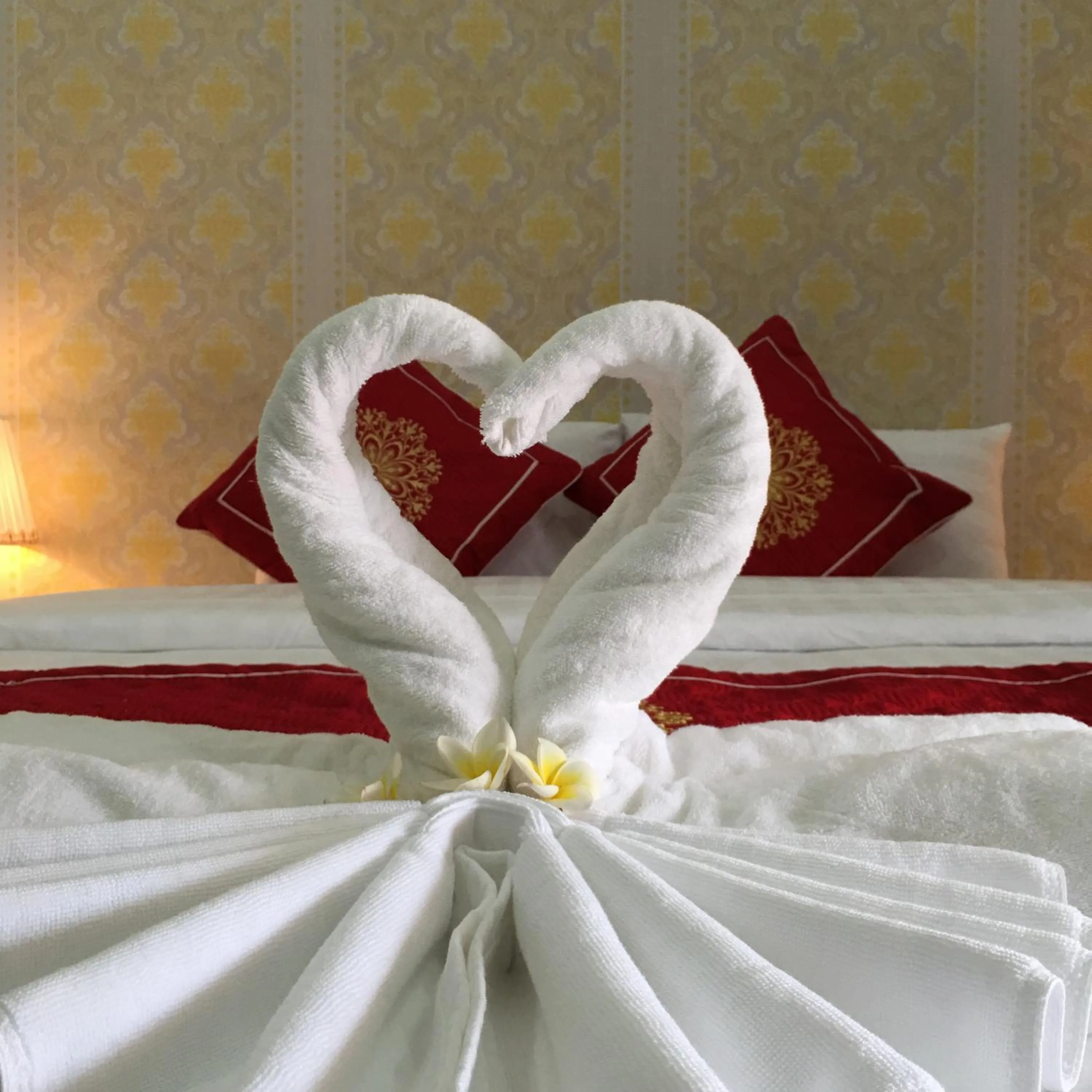 Bed in Le KhounSok Boutique Hotel