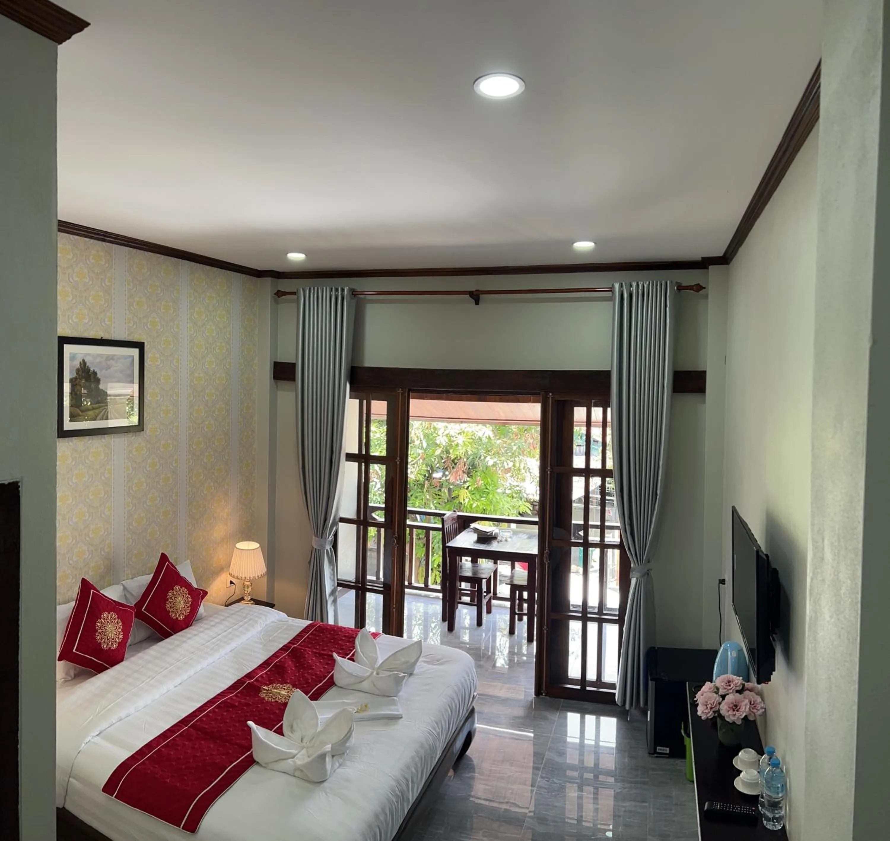 Bed in Le KhounSok Boutique Hotel