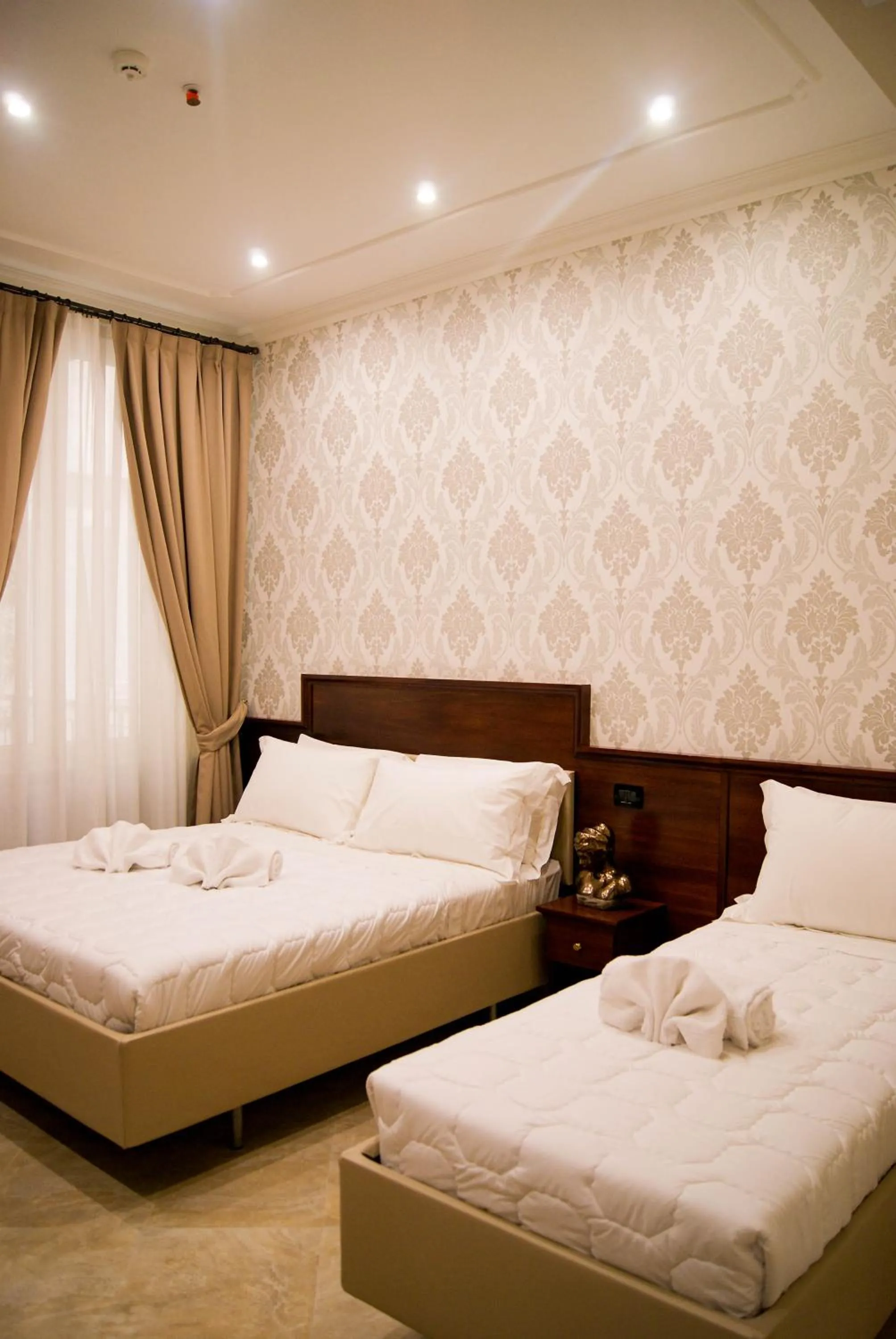 Triple Room in Esposizione Boutique