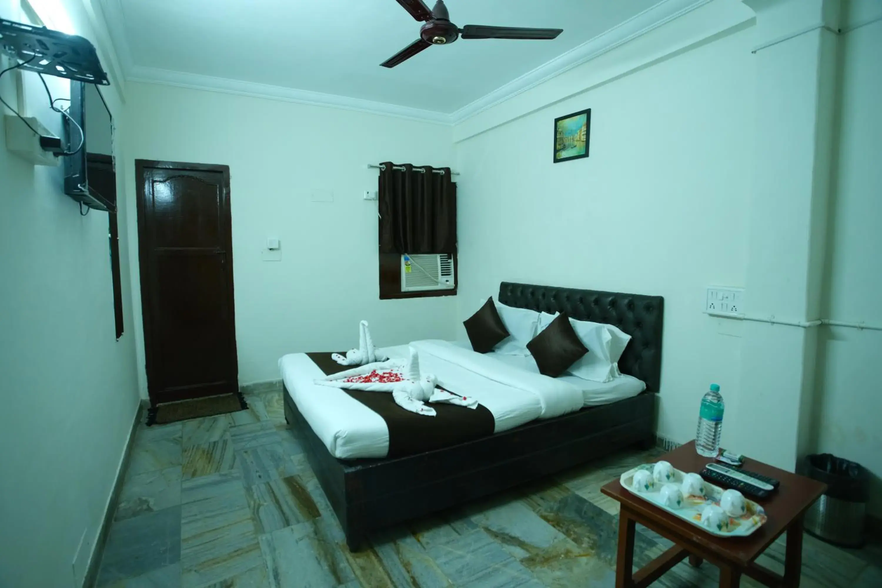 Bed in Ganesh Guest House Bed in Ganesh Guest House