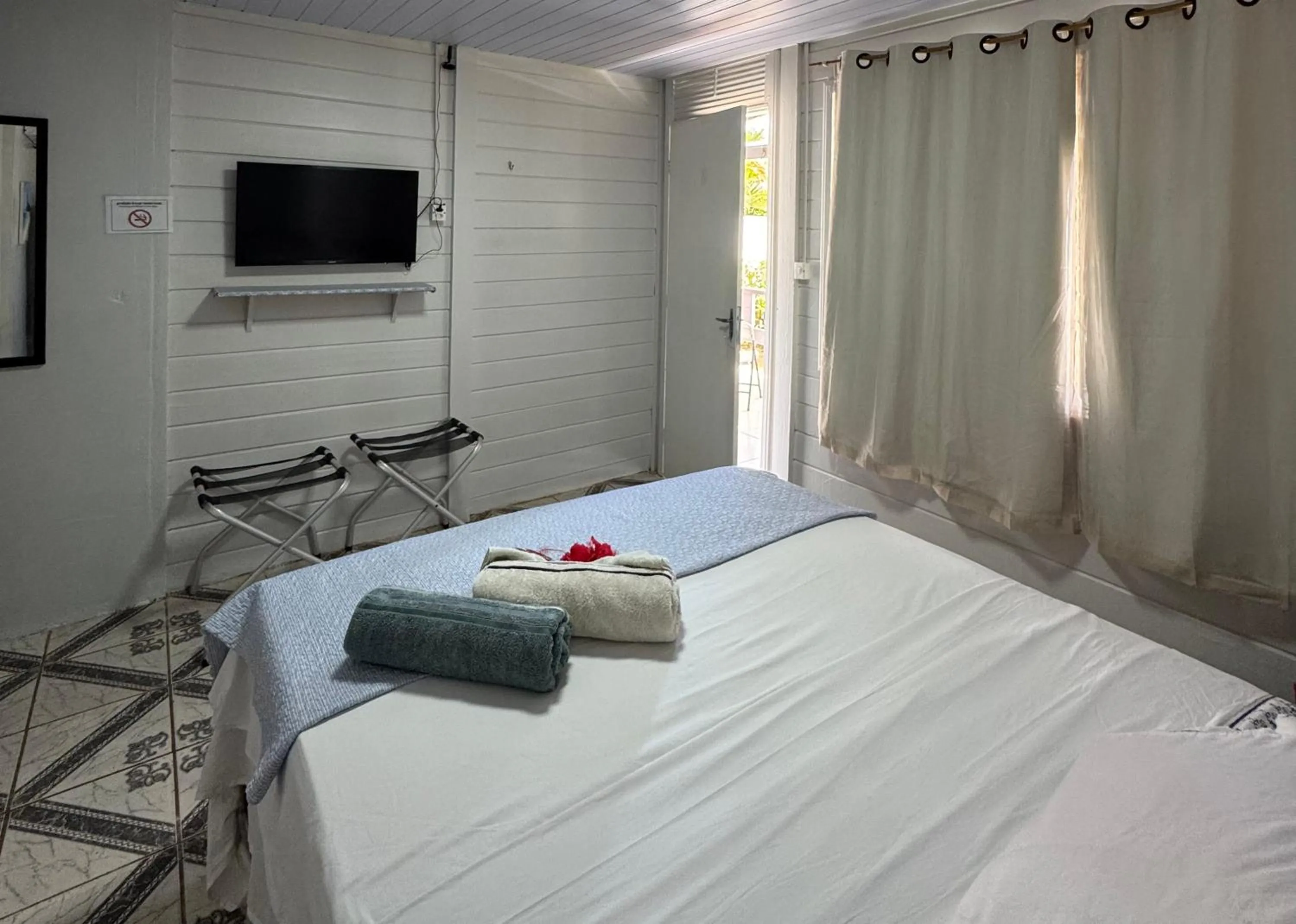 Bed in Pousada Rosemary Suítes