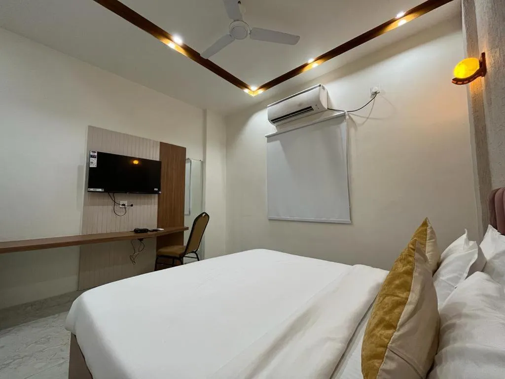 View (from property/room), Bed in Hotel Satsang Grand