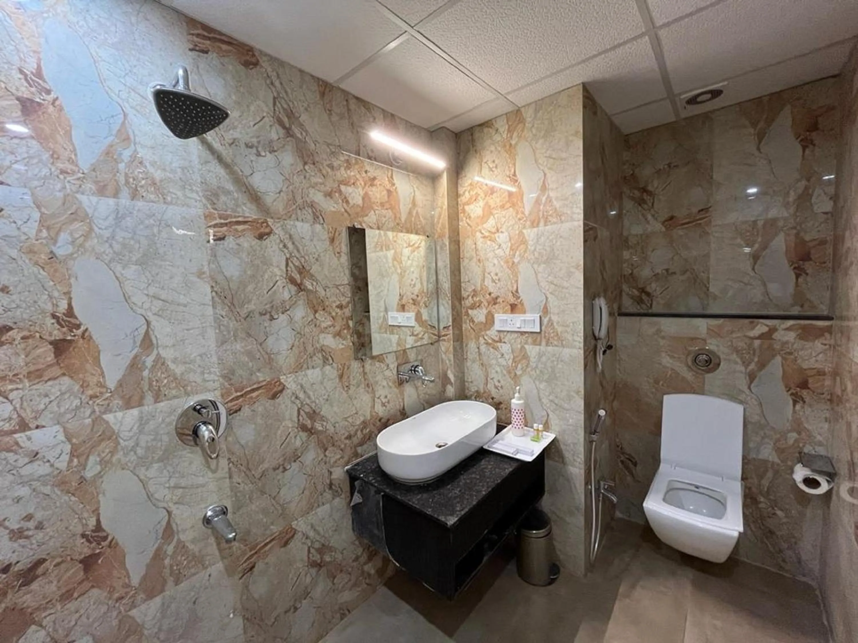 Bathroom in Hotel Satsang Grand