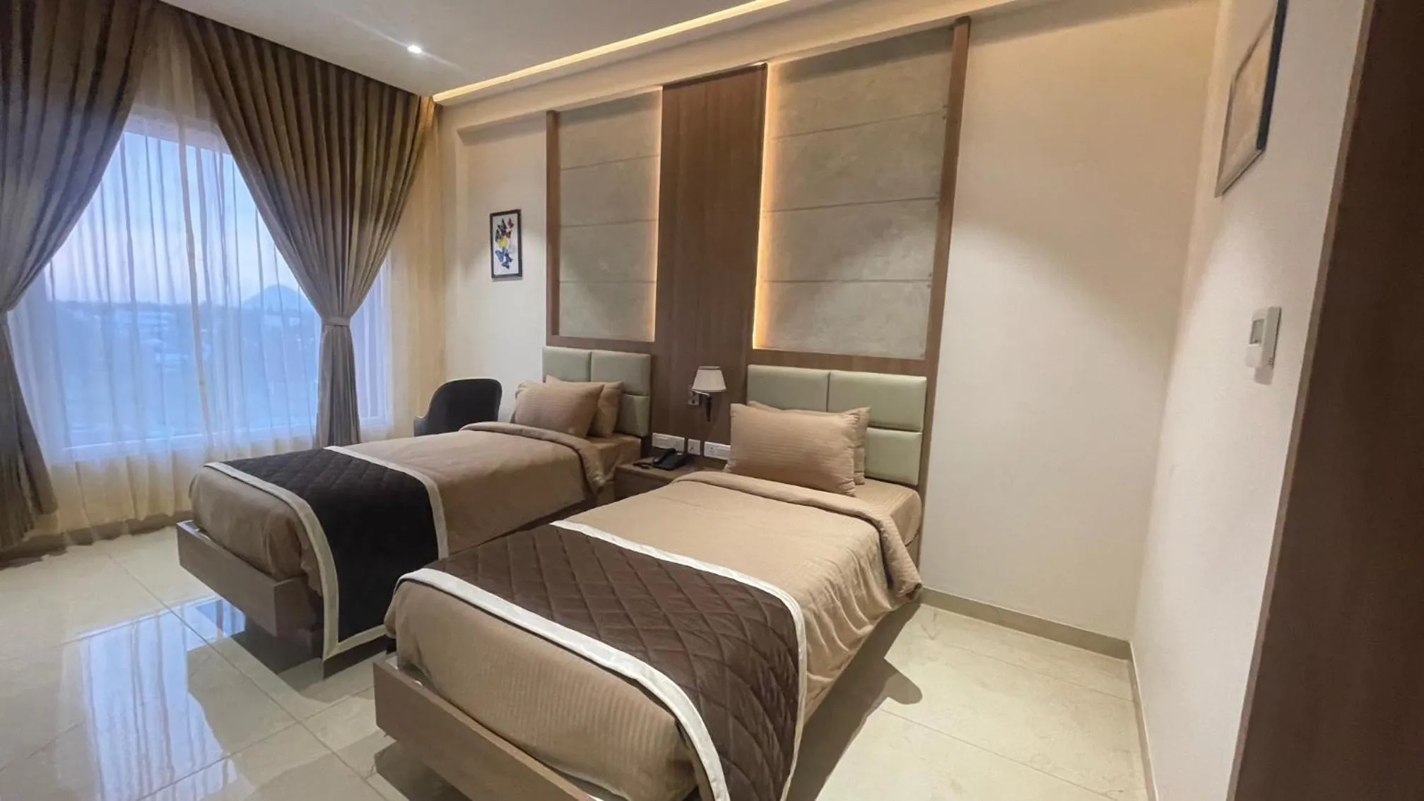 Bed in HOTEL VAHINI GRAND