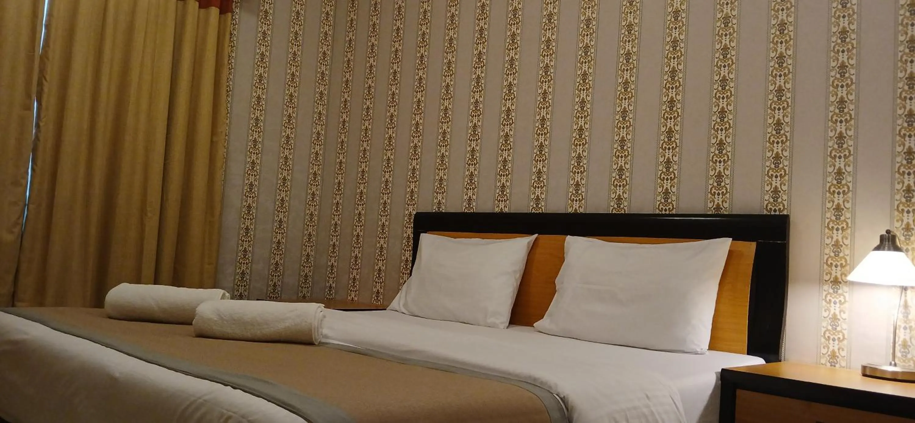 Bed in AL MARJAN FURNISHED APARTMENTS