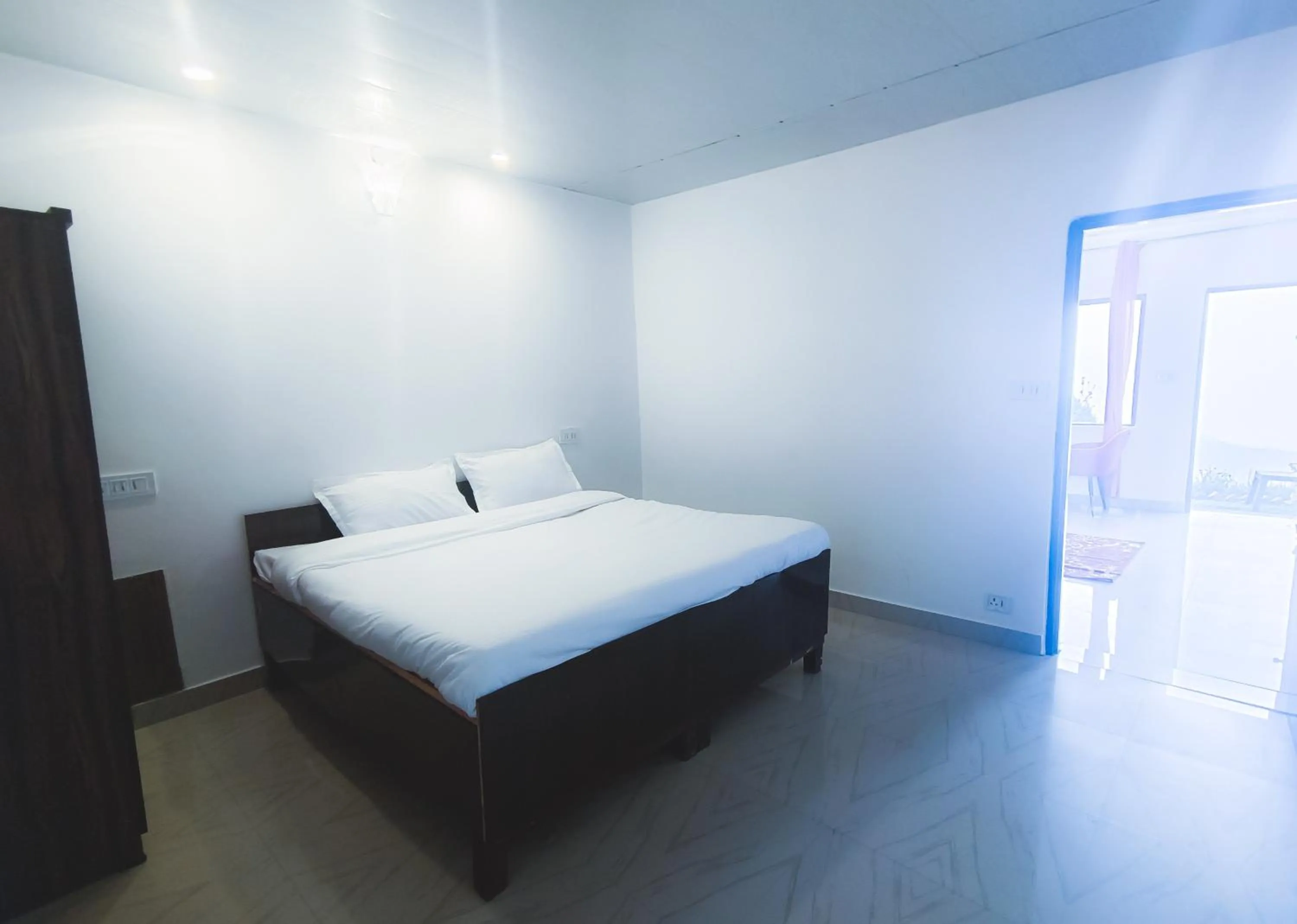 Bed in Haut Monde King's Paradise Resort