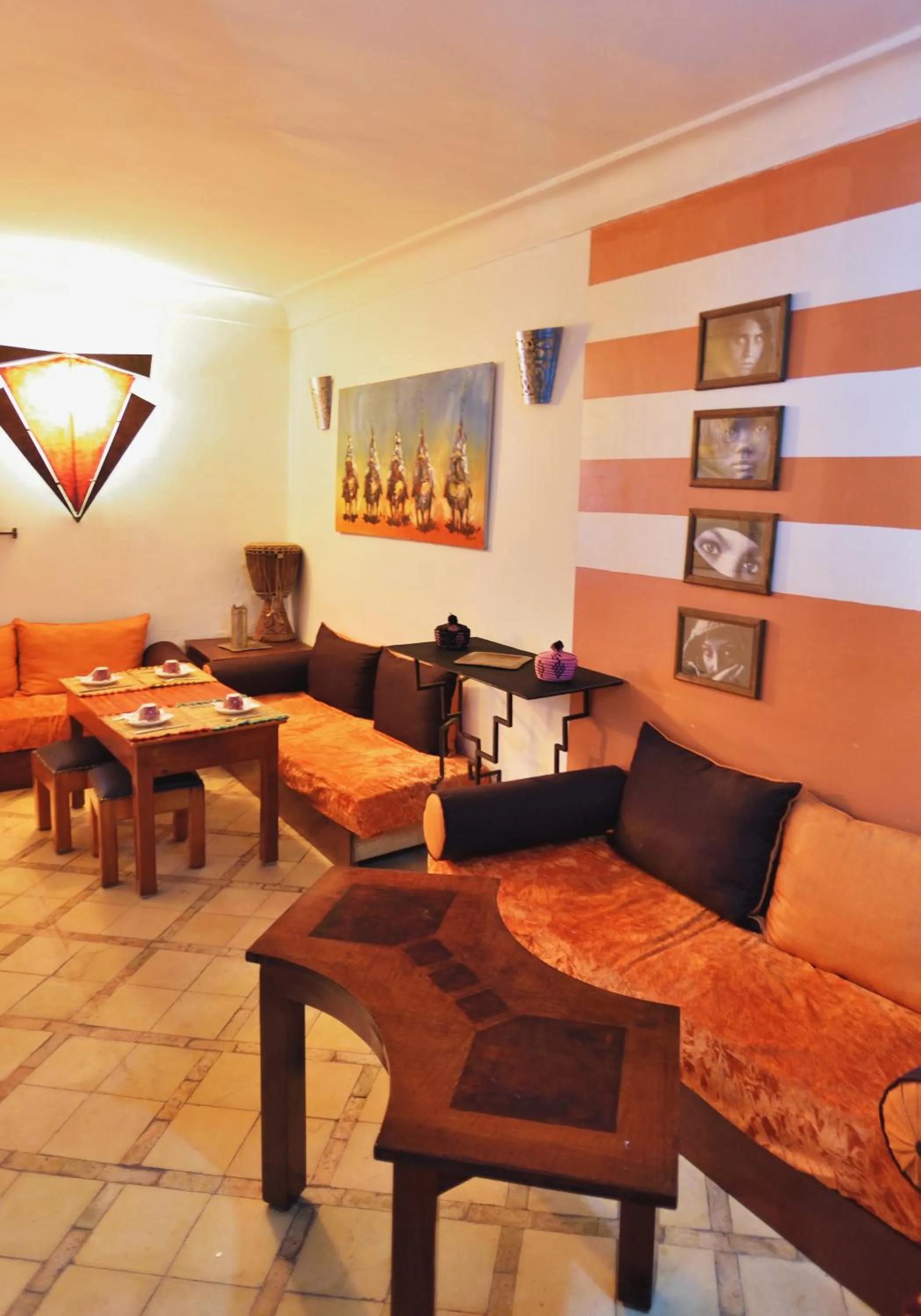 Communal lounge/ TV room in Riad Chalymar