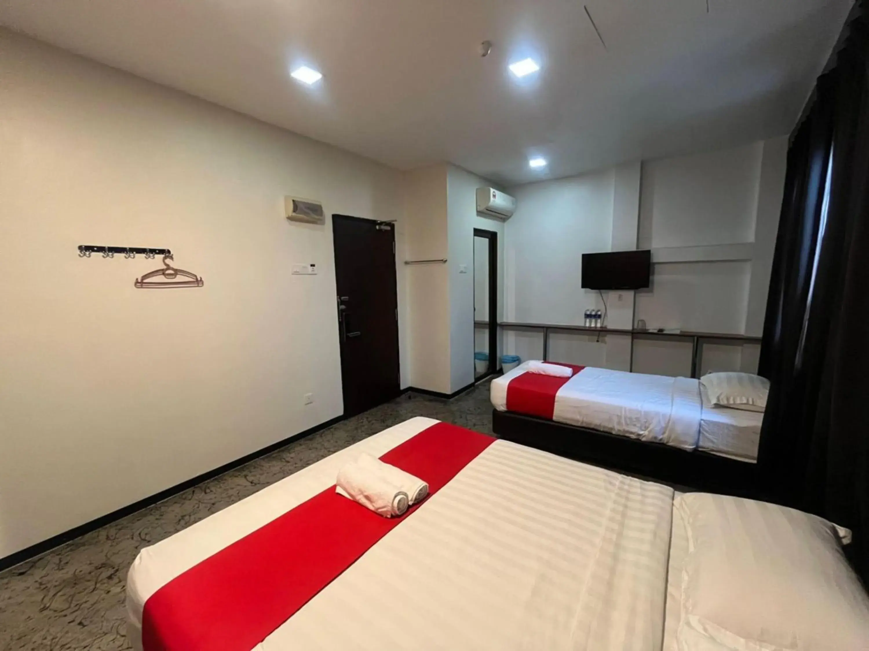 Triple Room in Capital O 89333 Musse Hotel Triple Room in Capital O 89333 Musse Hotel