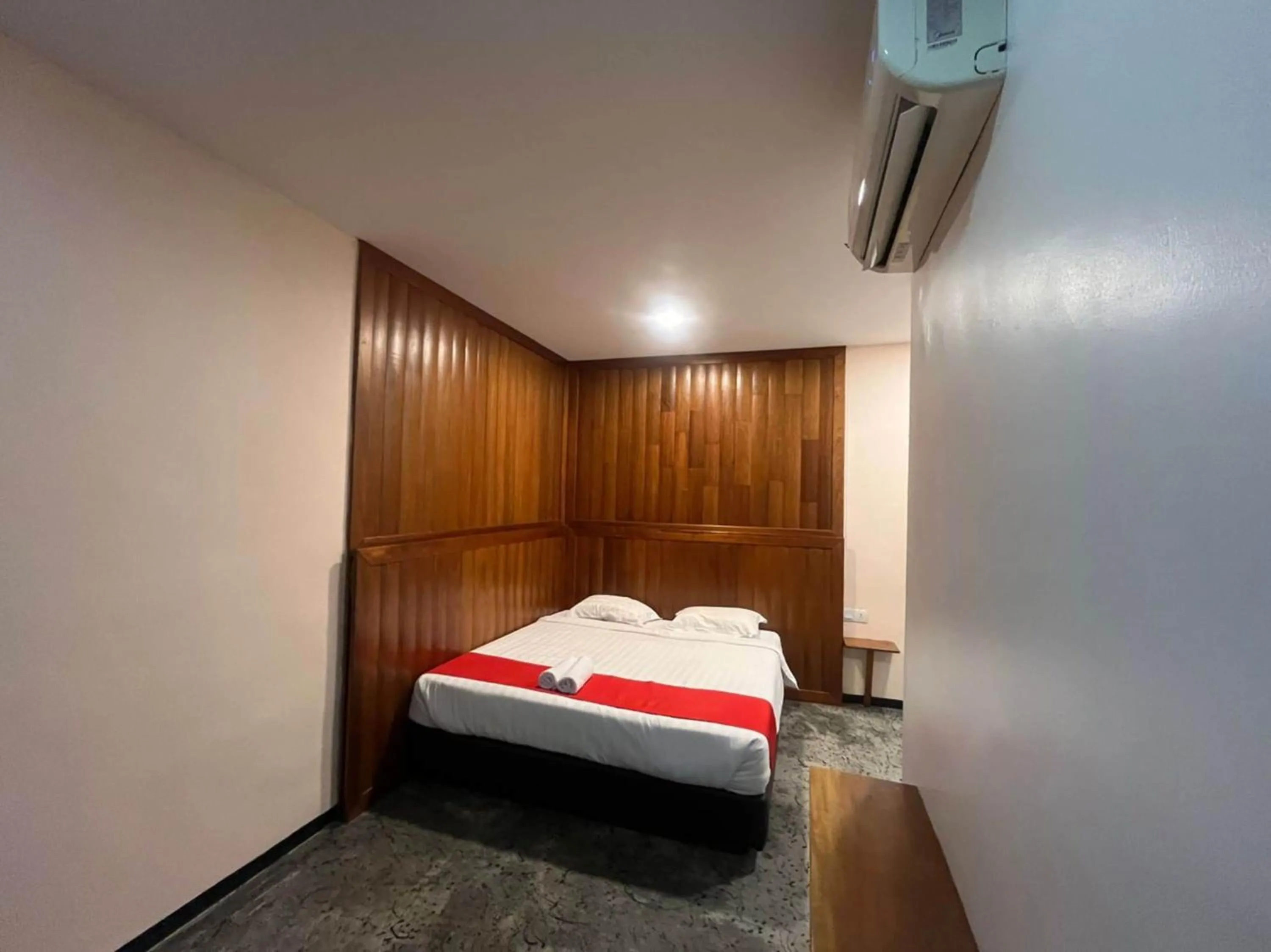 Bedroom in Capital O 89333 Musse Hotel