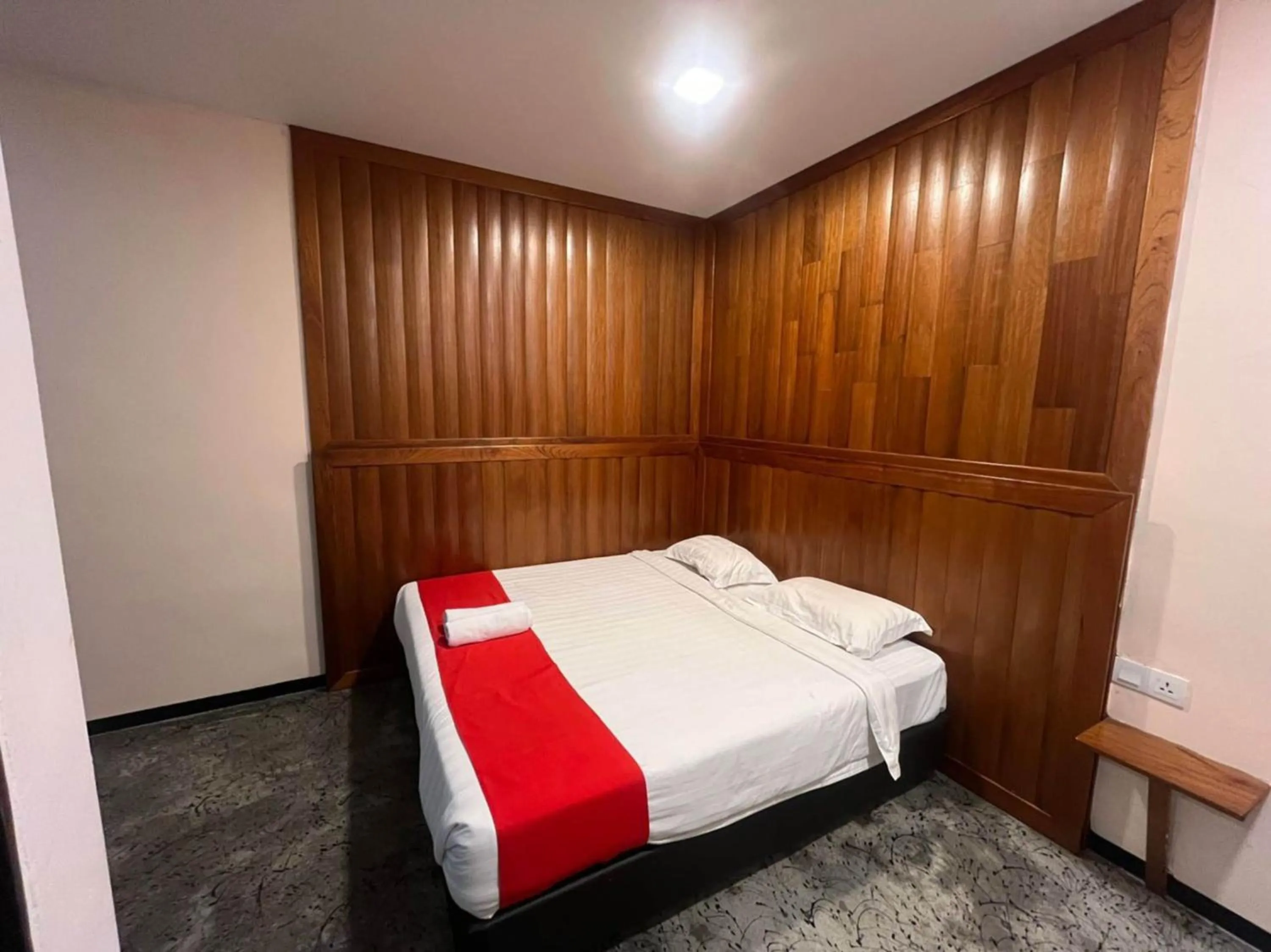 Bedroom in Capital O 89333 Musse Hotel