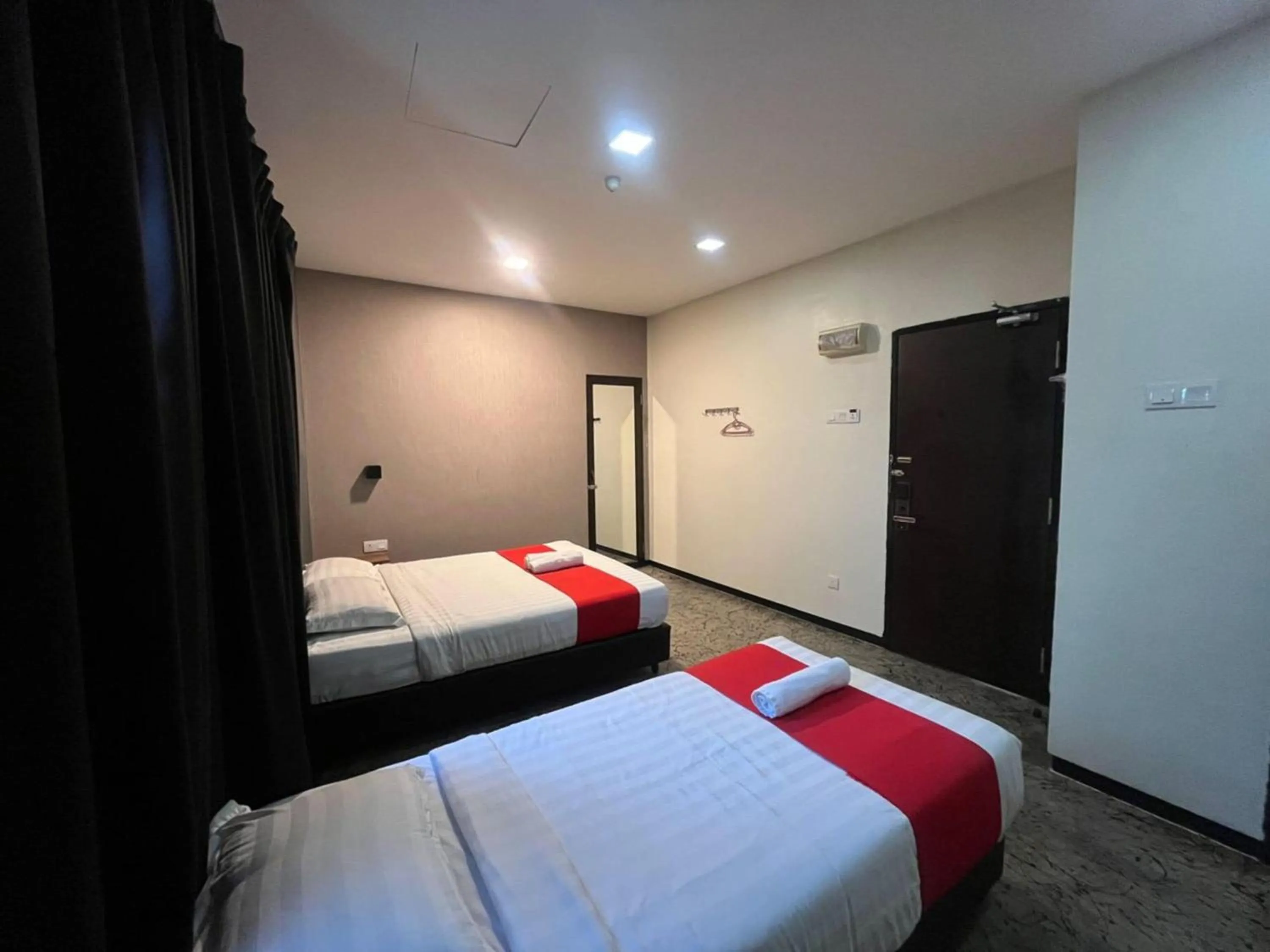 Bedroom in Capital O 89333 Musse Hotel