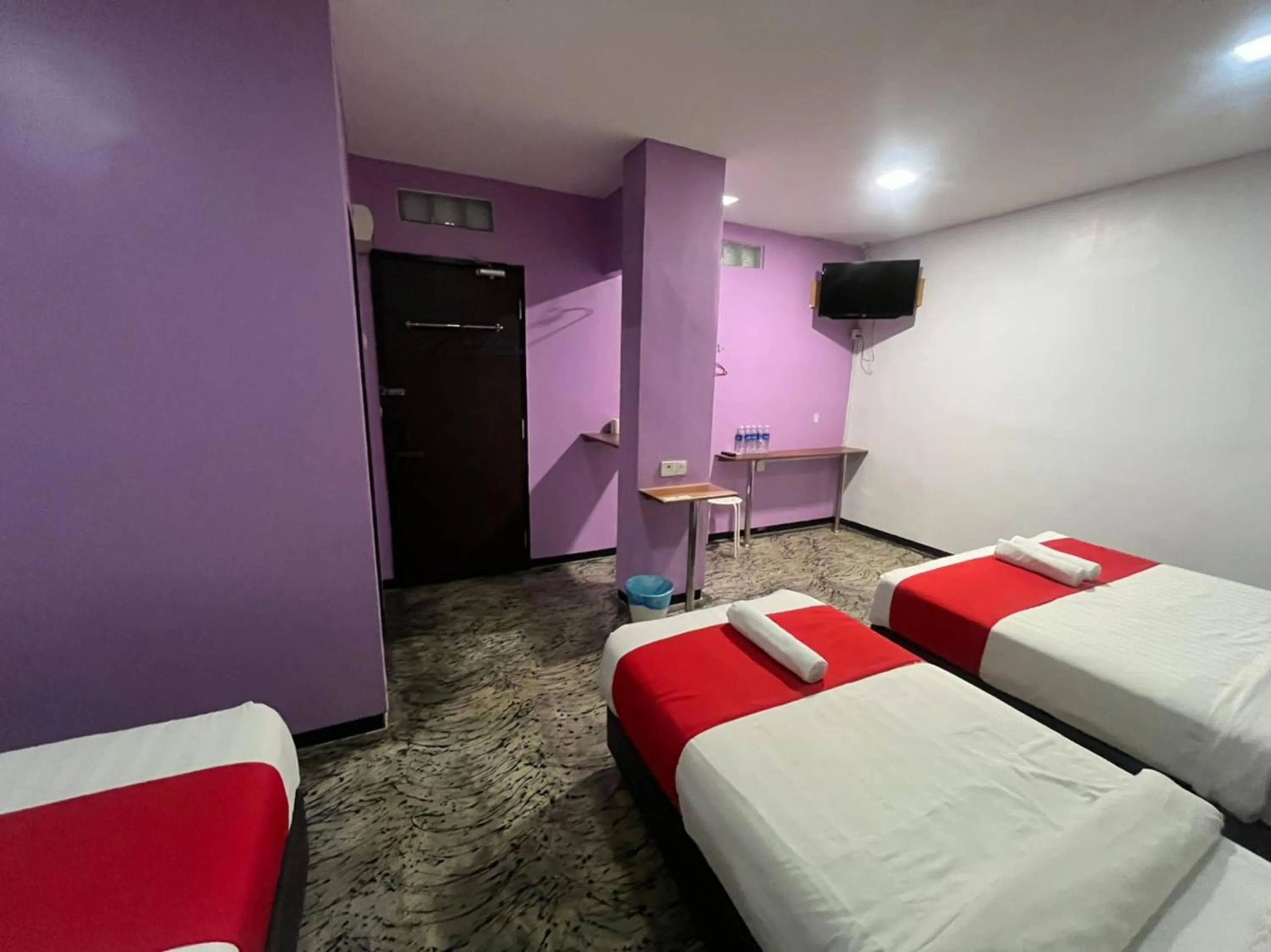 Bedroom in Capital O 89333 Musse Hotel