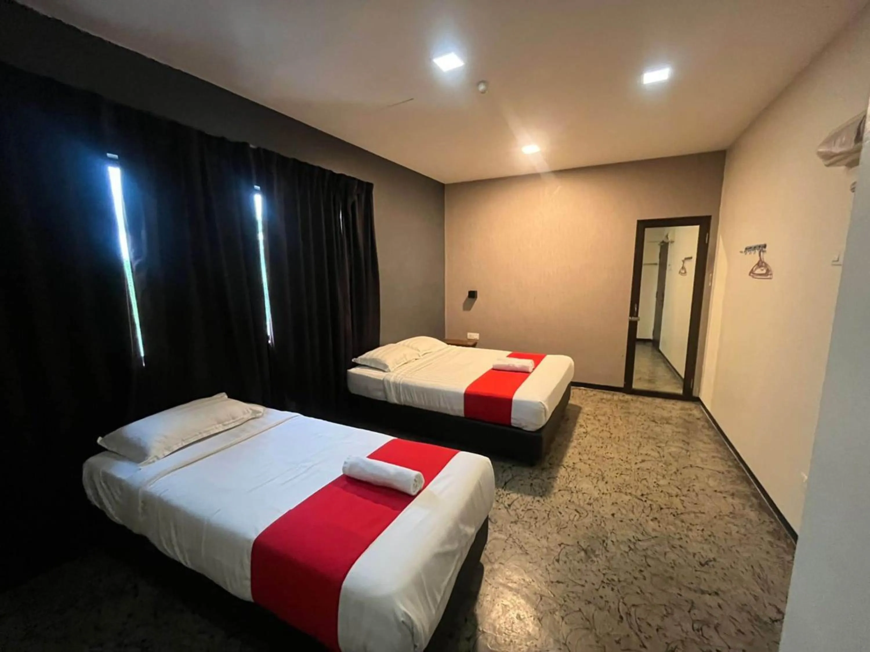 Bedroom in Capital O 89333 Musse Hotel