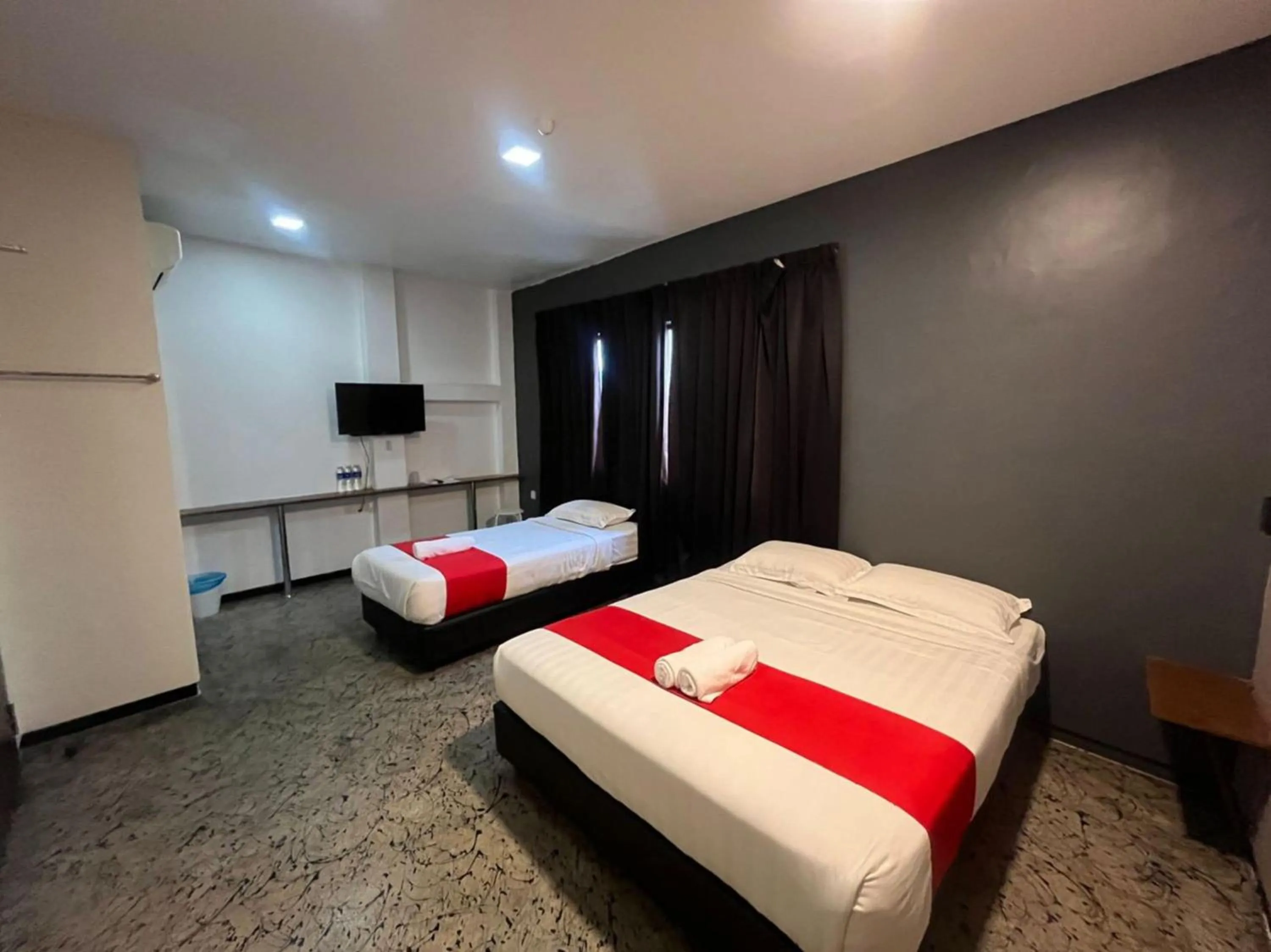 Bedroom in Capital O 89333 Musse Hotel