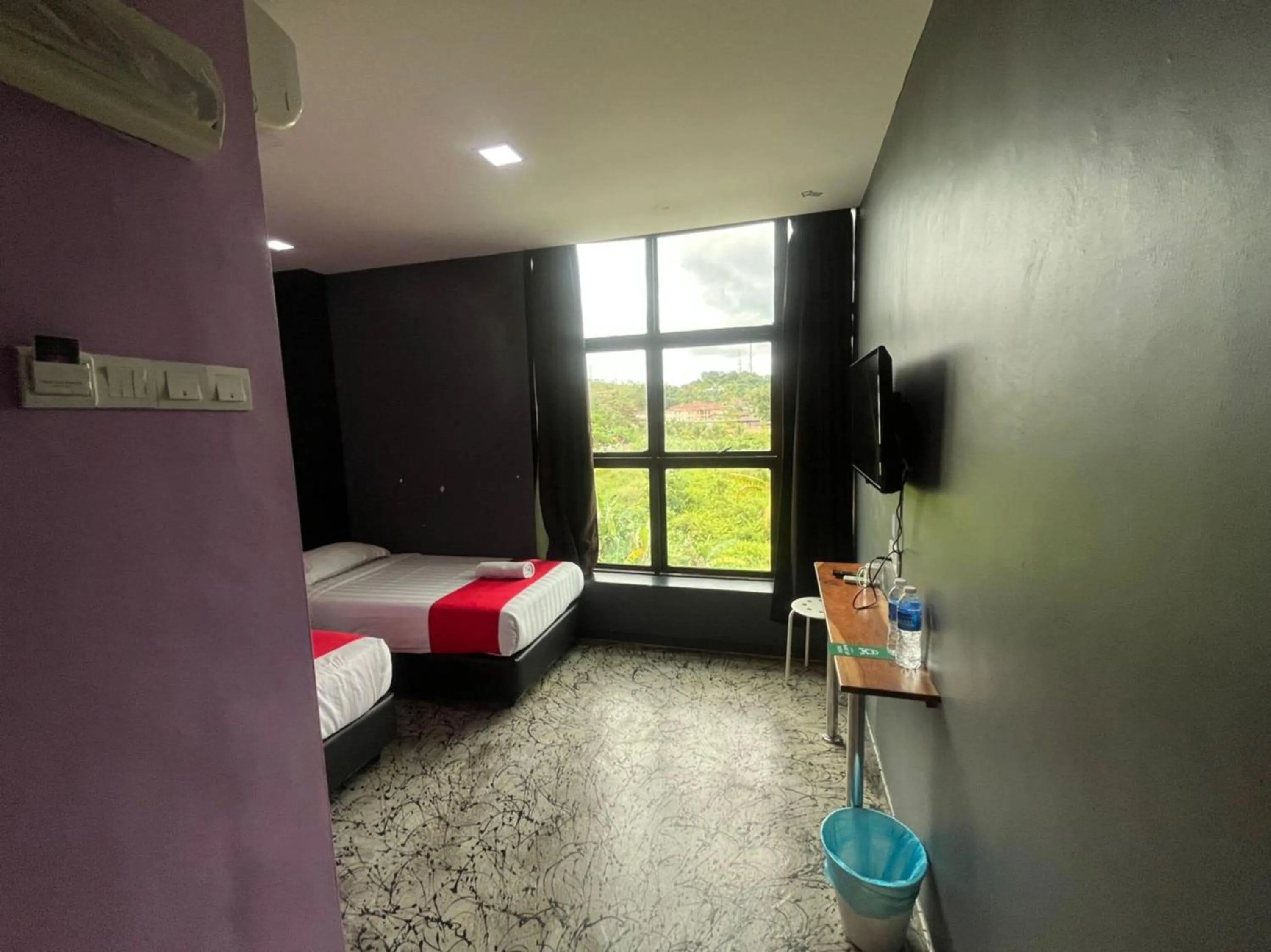 Bedroom in Capital O 89333 Musse Hotel