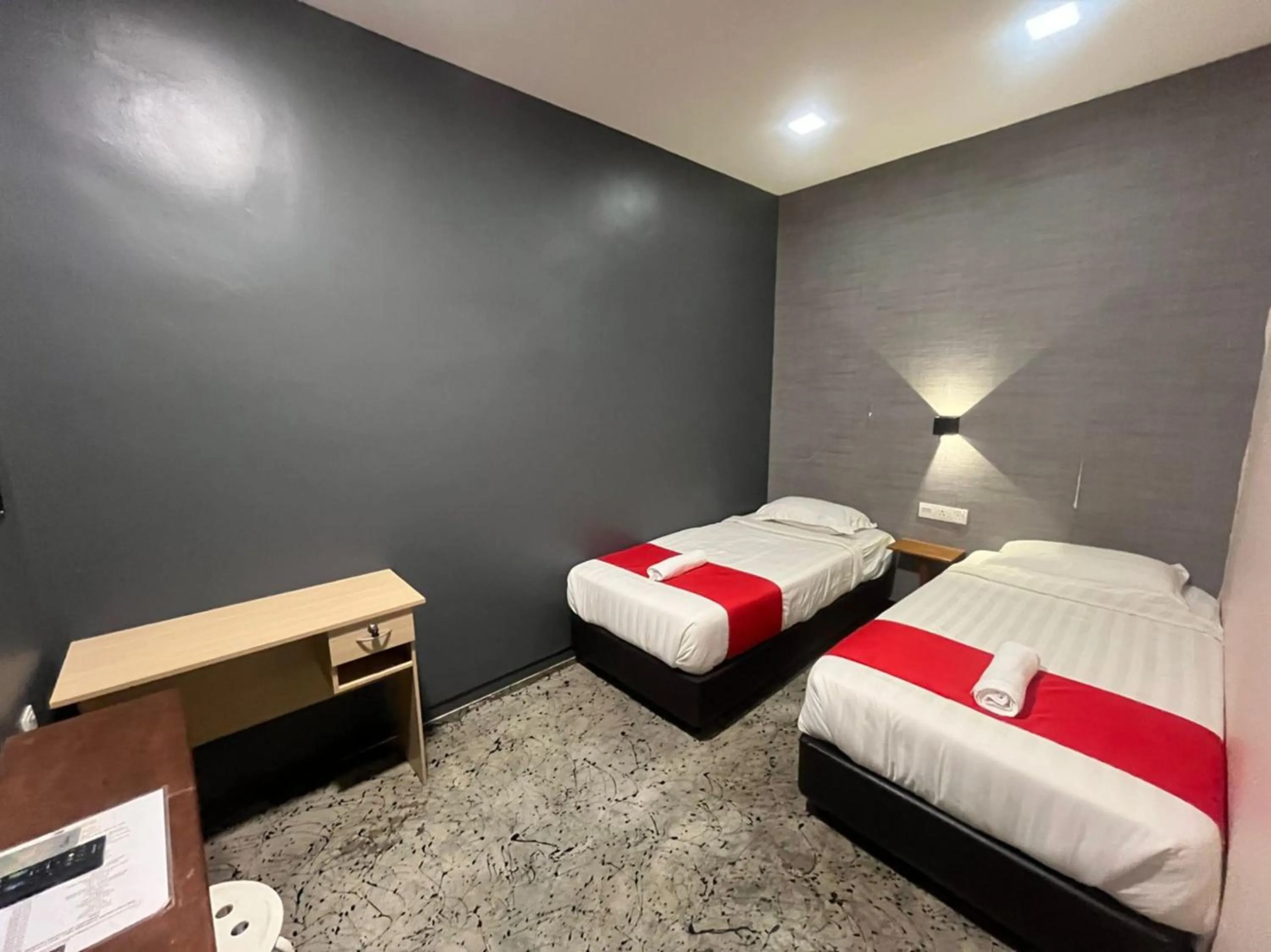 Bedroom in Capital O 89333 Musse Hotel