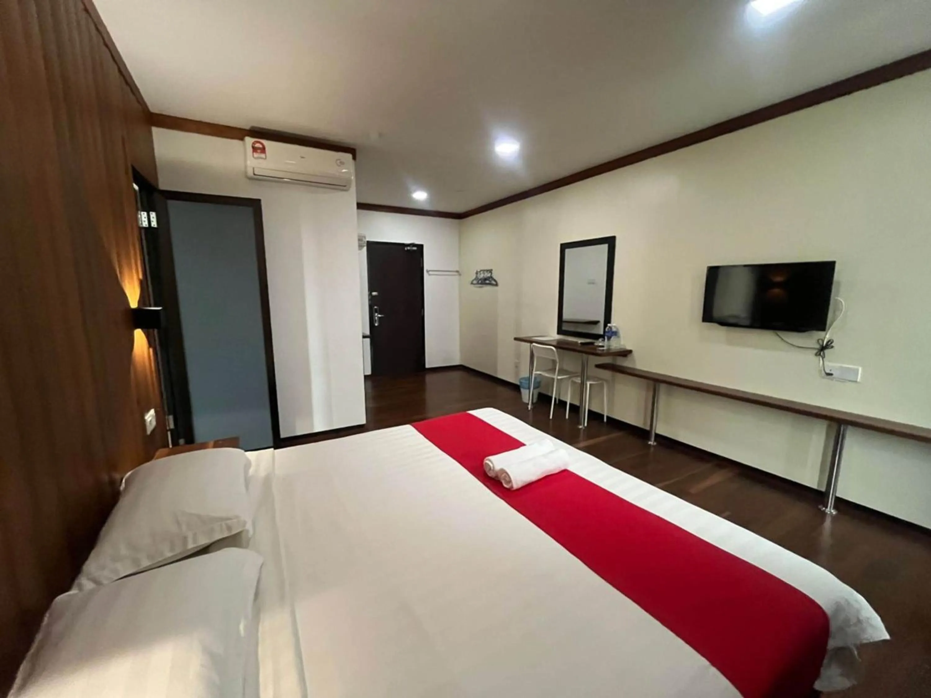 Bedroom in Capital O 89333 Musse Hotel