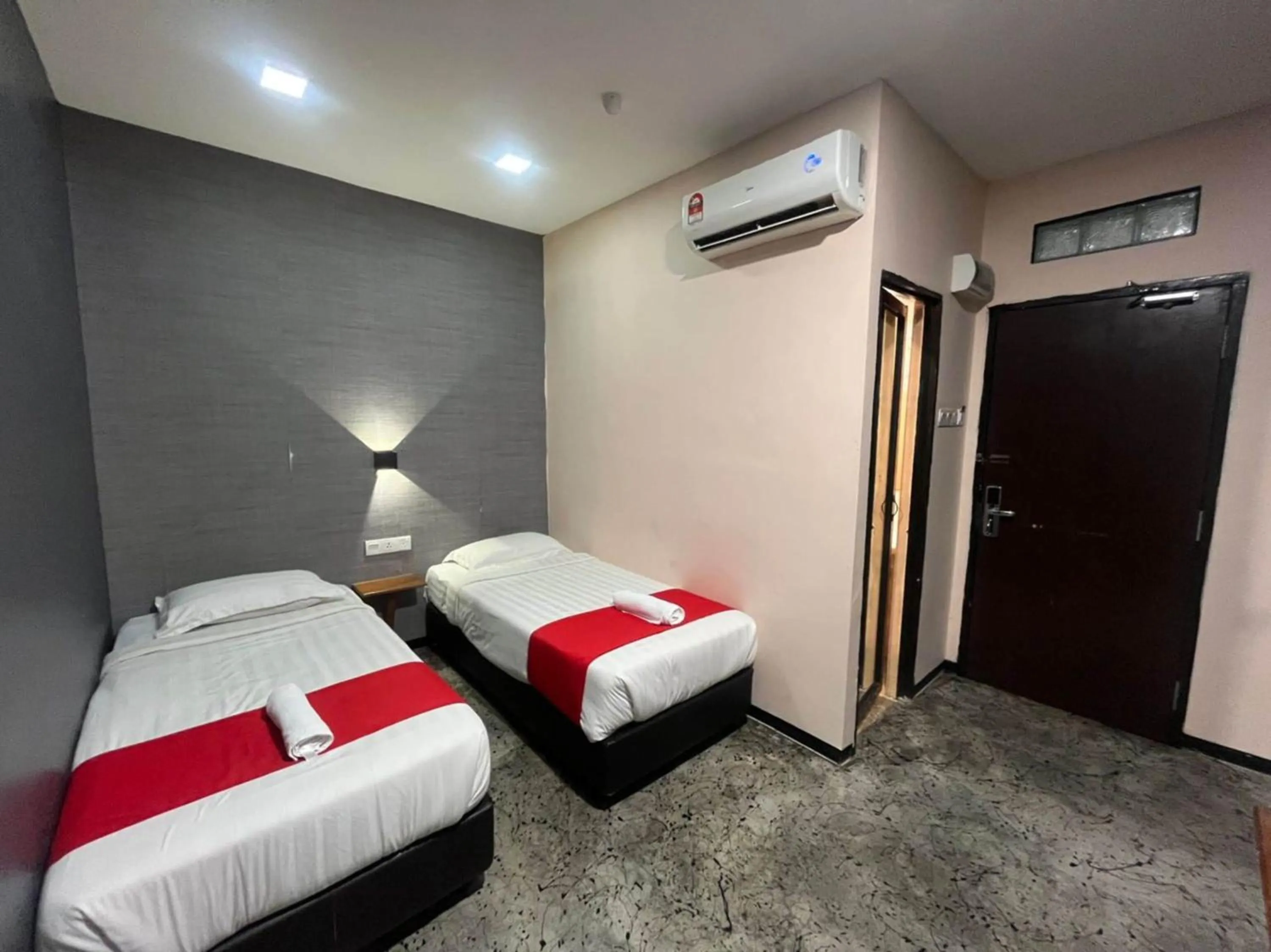 Bedroom in Capital O 89333 Musse Hotel