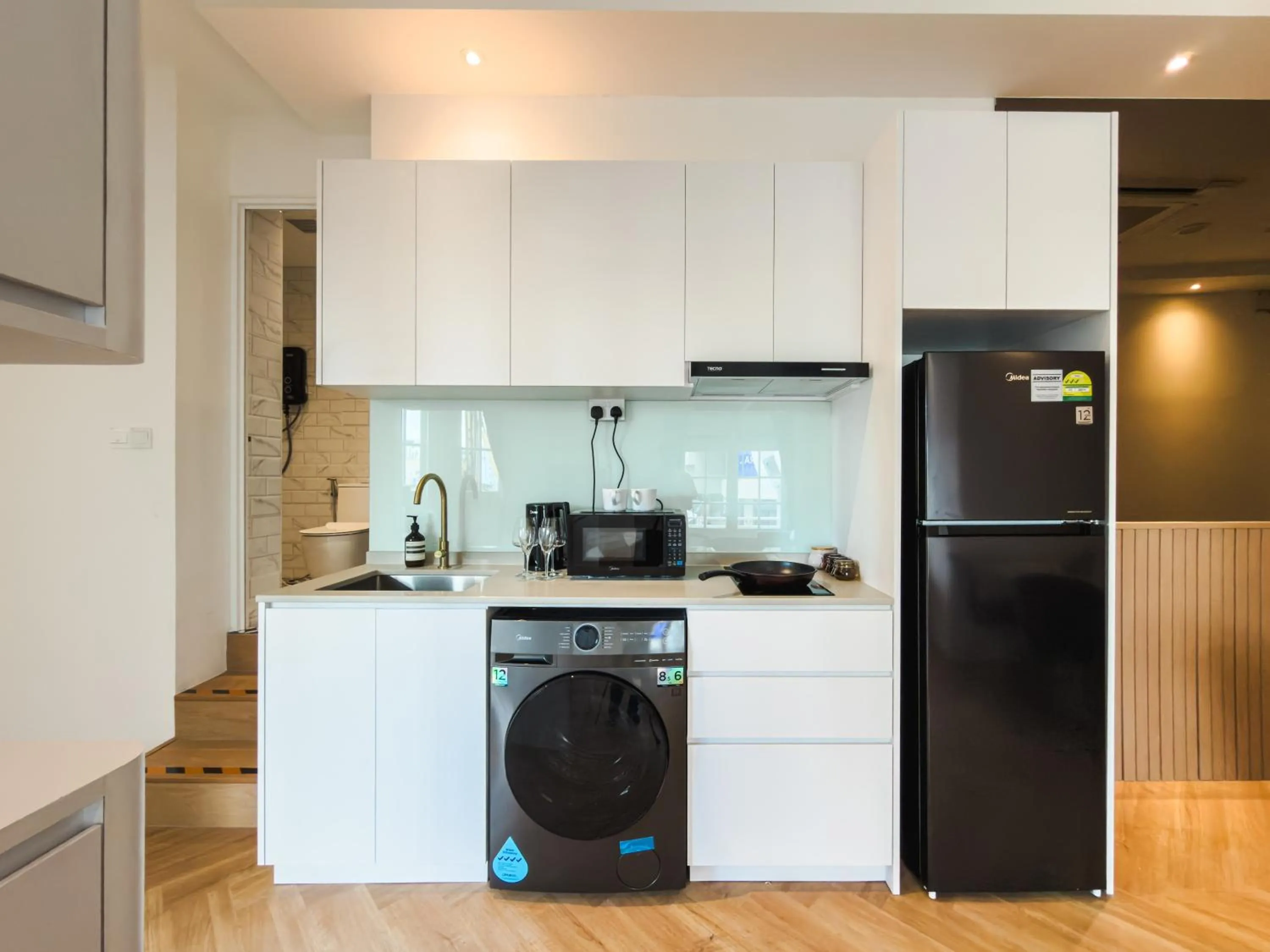 Kitchen or kitchenette in The White House - Serviced Residences by Cove & Belle Living