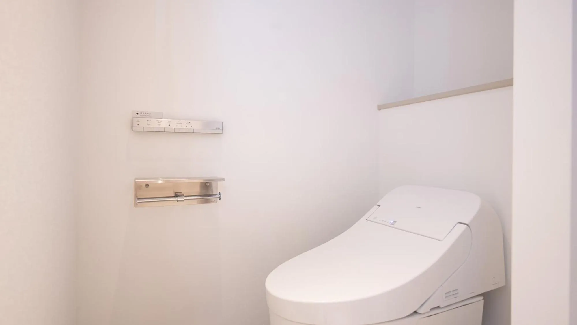 Toilet in REF Okinawa Arena by VESSEL HOTELS