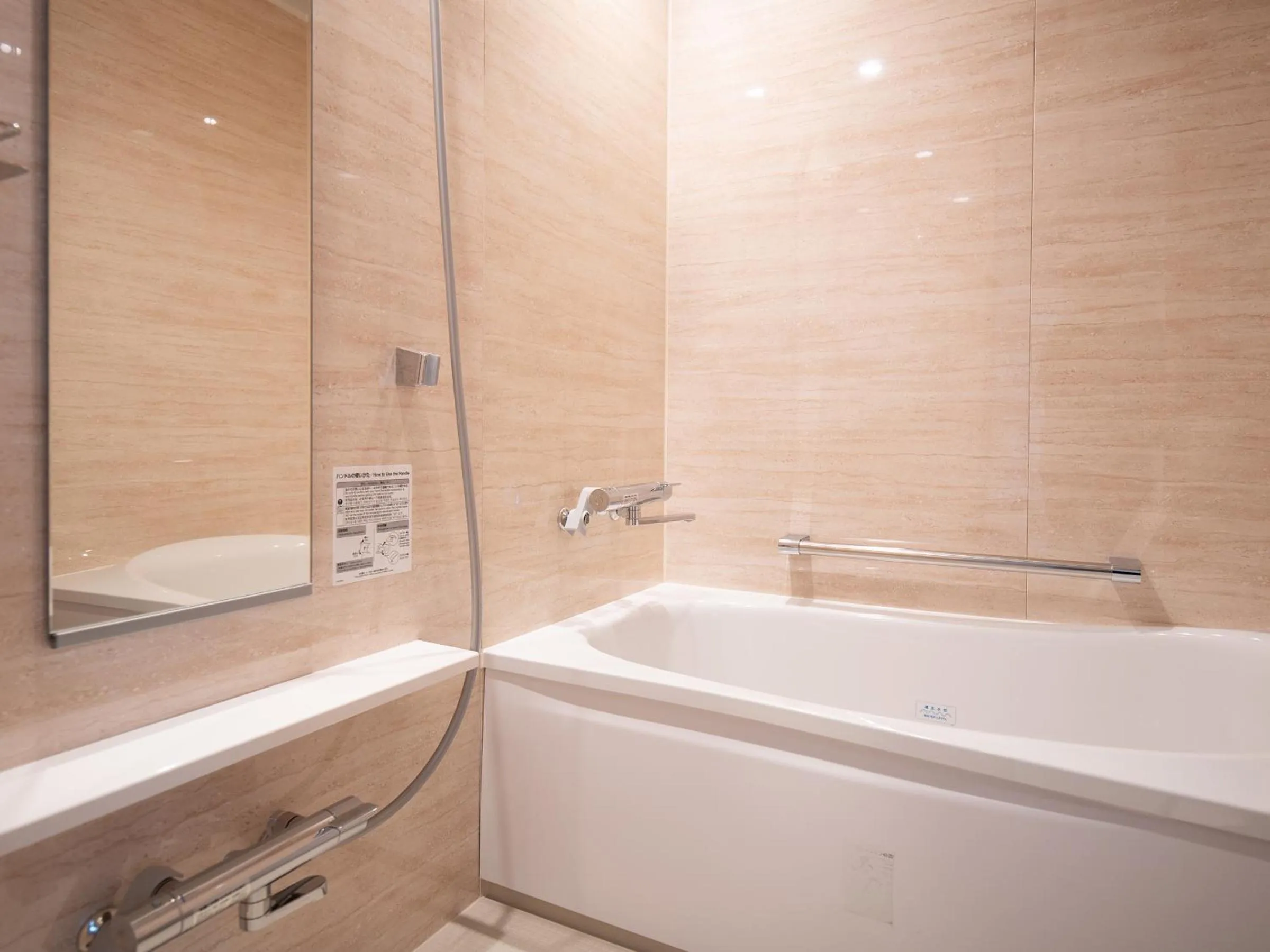 Bathroom in REF Okinawa Arena by VESSEL HOTELS