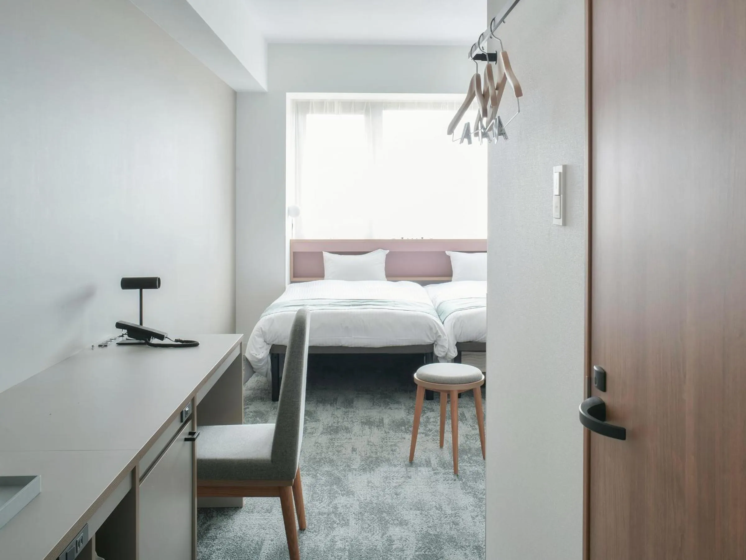 Bed in REF Okinawa Arena by VESSEL HOTELS