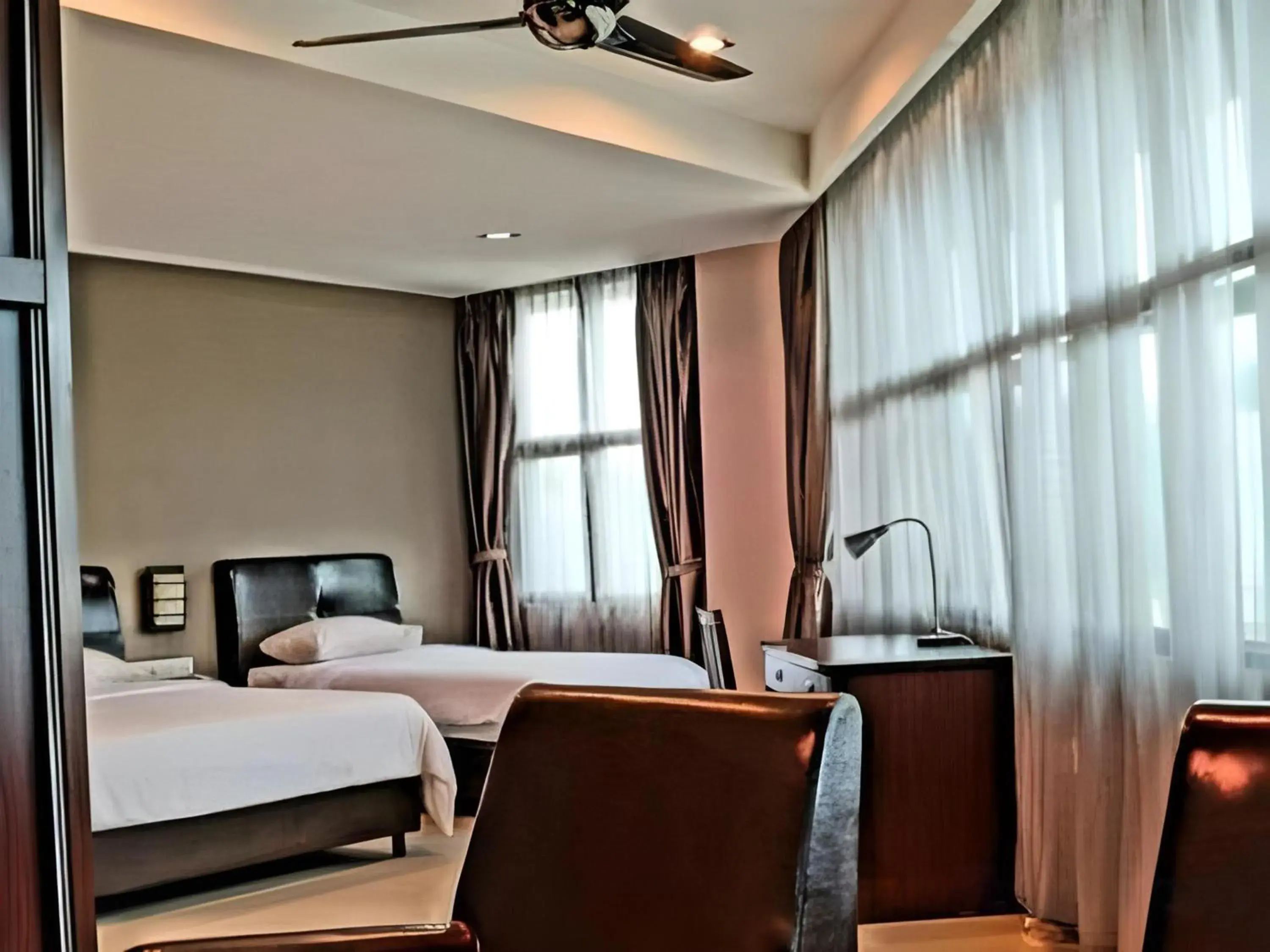 Photo of the whole room, Bed in Capital O Rail Hotel Photo of the whole room, Bed in Capital O Rail Hotel