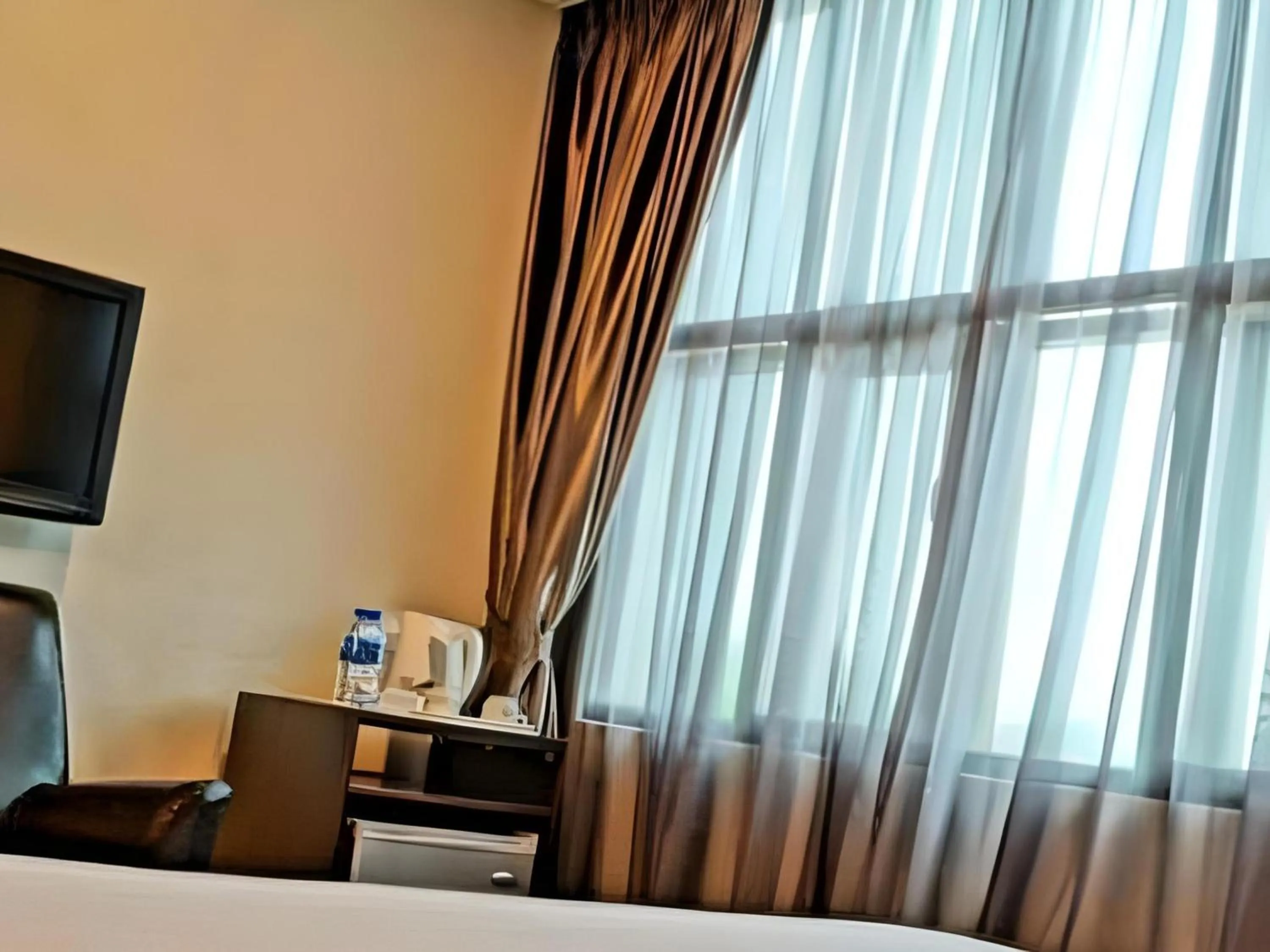 Photo of the whole room, Bed in Capital O Rail Hotel